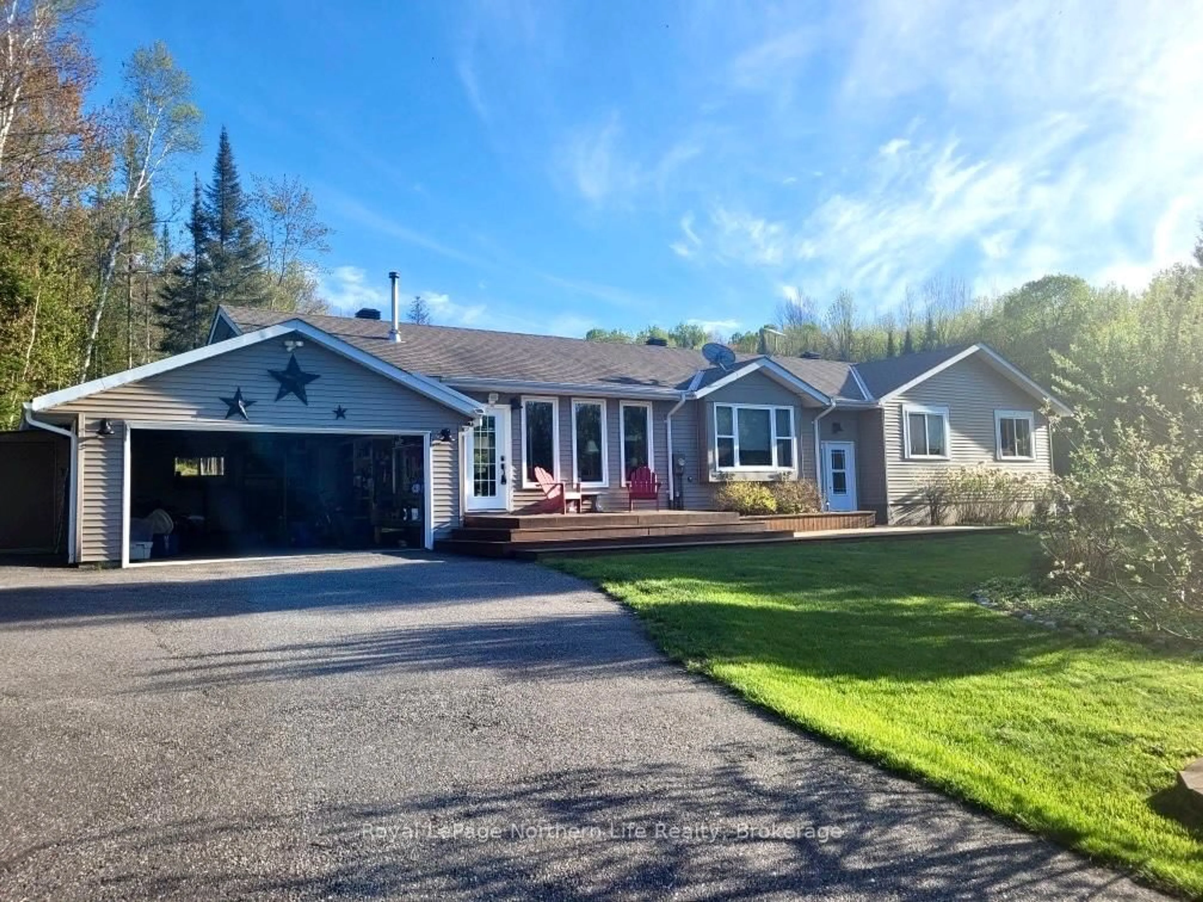 A pic from outside/outdoor area/front of a property/back of a property/a pic from drone, street for 11 Rivers Rd, Callander Ontario P0H 1H0