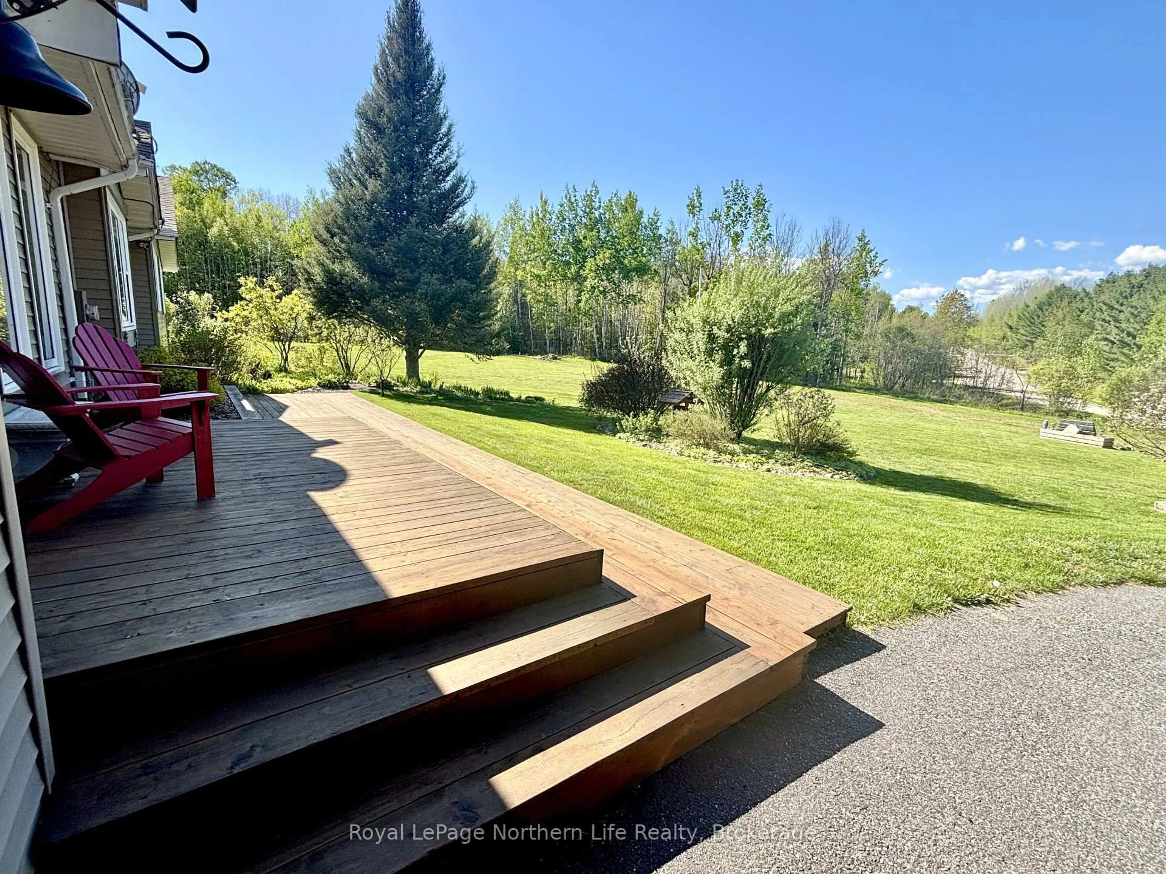 A pic from outside/outdoor area/front of a property/back of a property/a pic from drone, forest/trees view for 11 Rivers Rd, Callander Ontario P0H 1H0