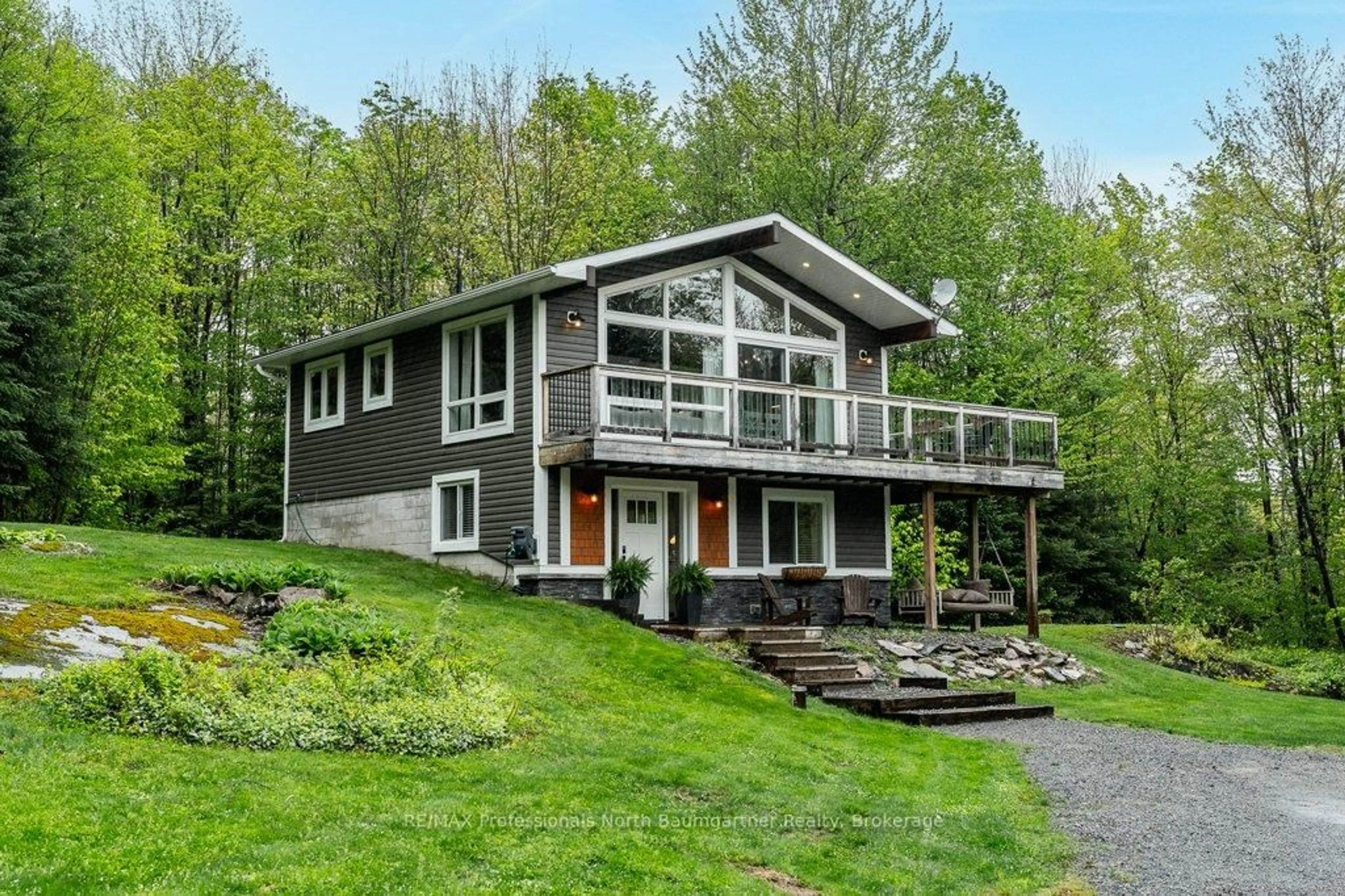 Home with vinyl exterior material, water/lake/river/ocean view for 1521 Bobcaygeon Rd, Minden Hills Ontario K0M 2K0