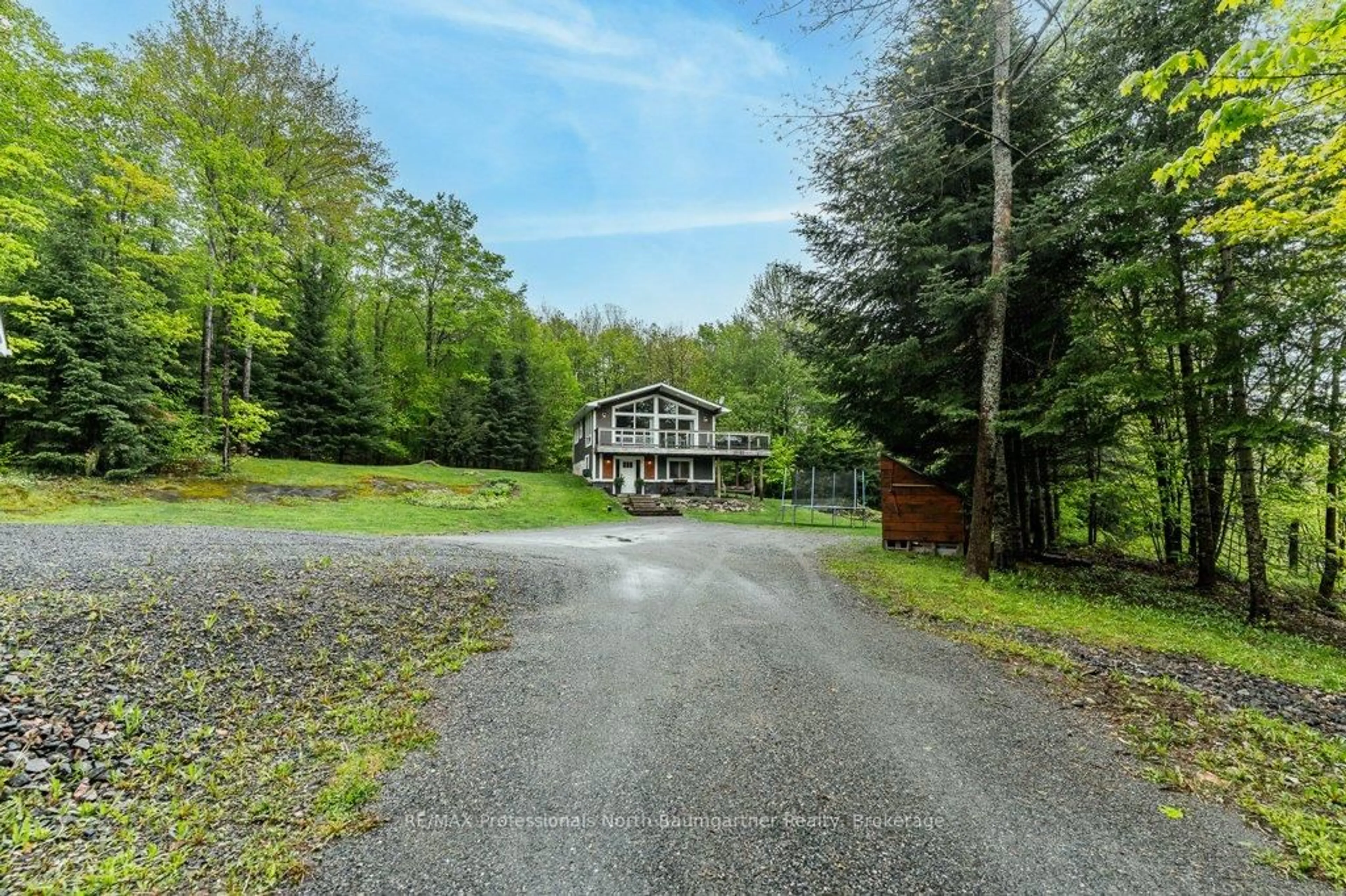 A pic from outside/outdoor area/front of a property/back of a property/a pic from drone, unknown for 1521 Bobcaygeon Rd, Minden Hills Ontario K0M 2K0