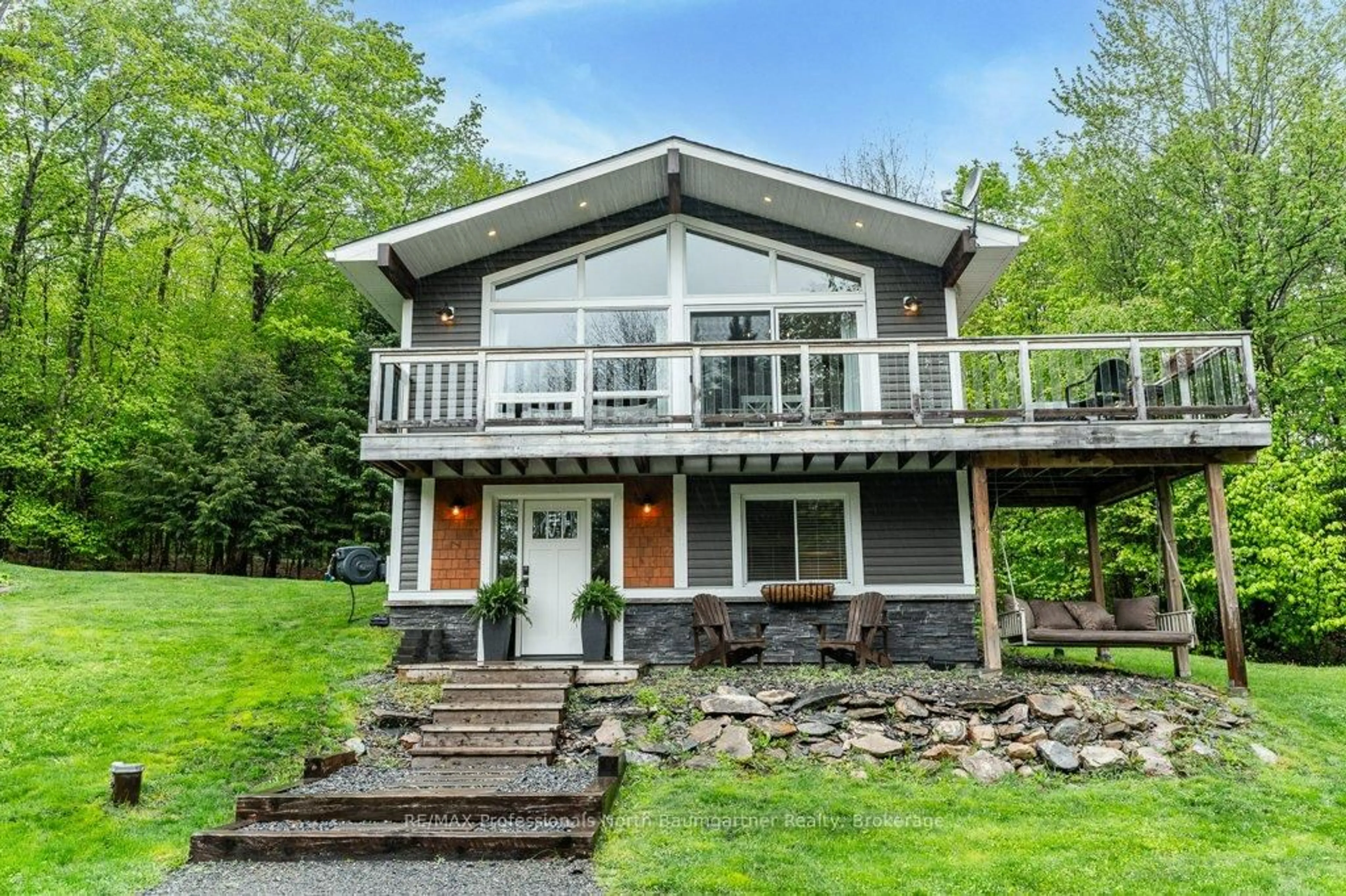 Home with vinyl exterior material, water/lake/river/ocean view for 1521 Bobcaygeon Rd, Minden Hills Ontario K0M 2K0