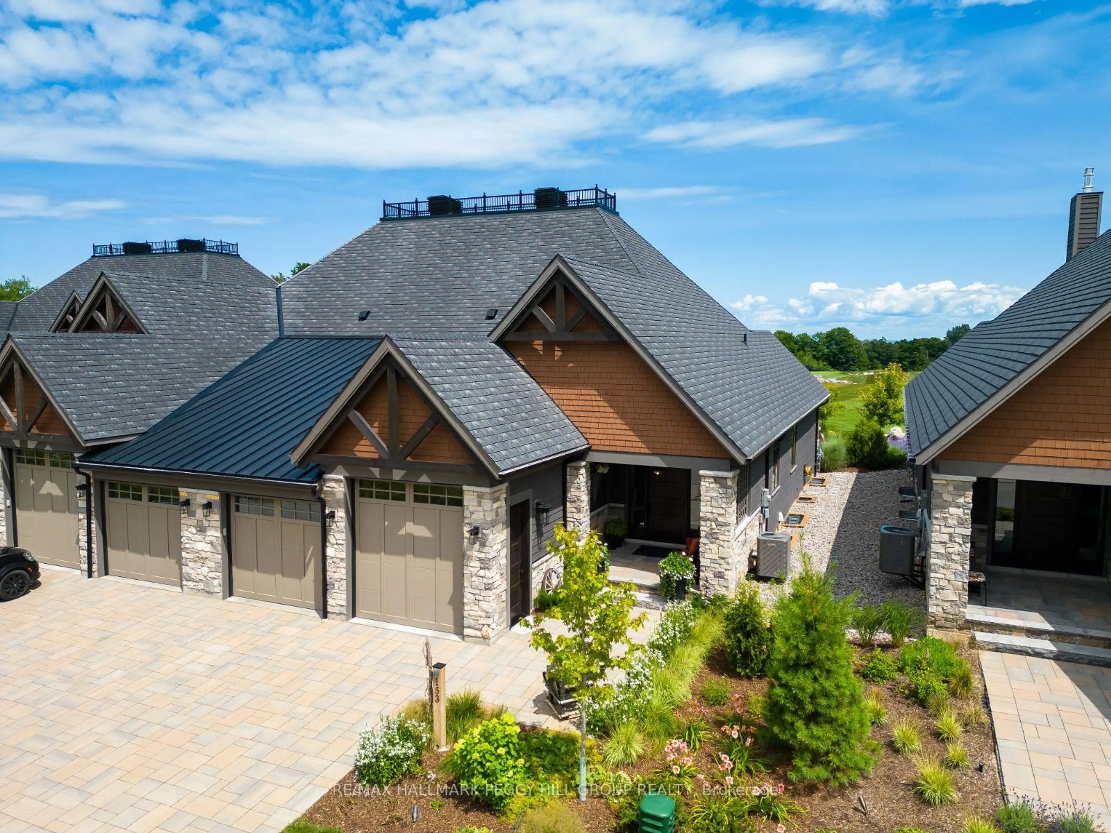 Home with brick exterior material, mountain view for 153 Georgian Bay Lane, Blue Mountains Ontario N0H 1J0