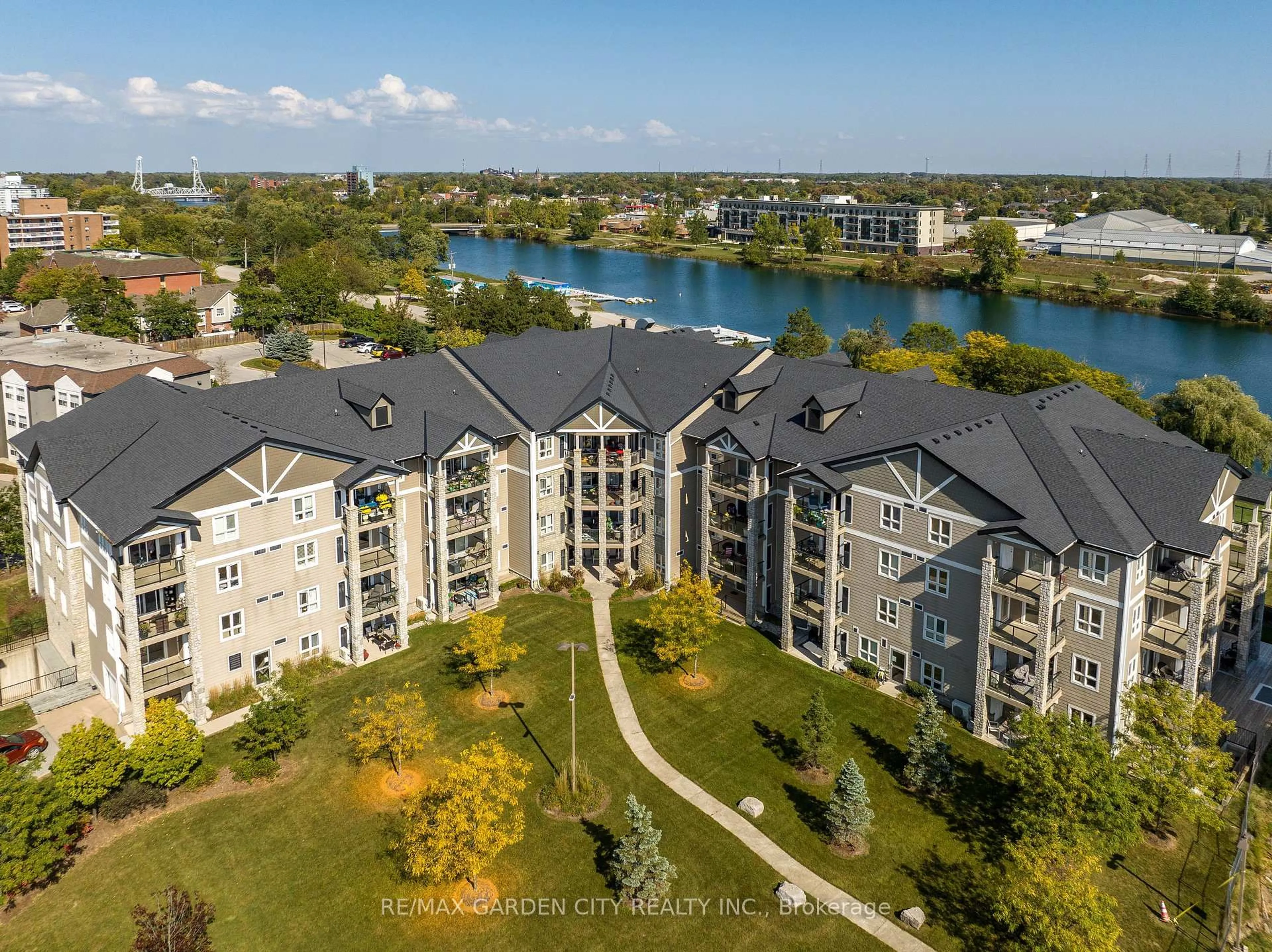 A pic from outside/outdoor area/front of a property/back of a property/a pic from drone, water/lake/river/ocean view for 330 PRINCE CHARLES Dr #1204, Welland Ontario L3C 7B3