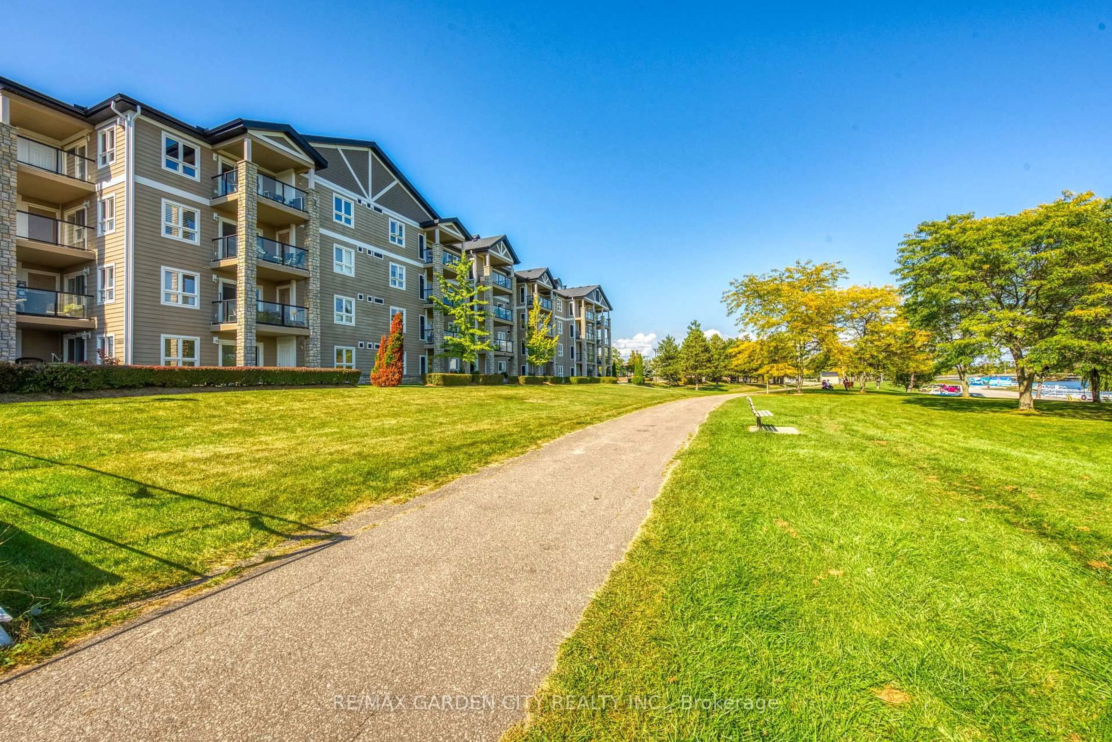 A pic from outside/outdoor area/front of a property/back of a property/a pic from drone, water/lake/river/ocean view for 330 PRINCE CHARLES Dr #1204, Welland Ontario L3C 7B3