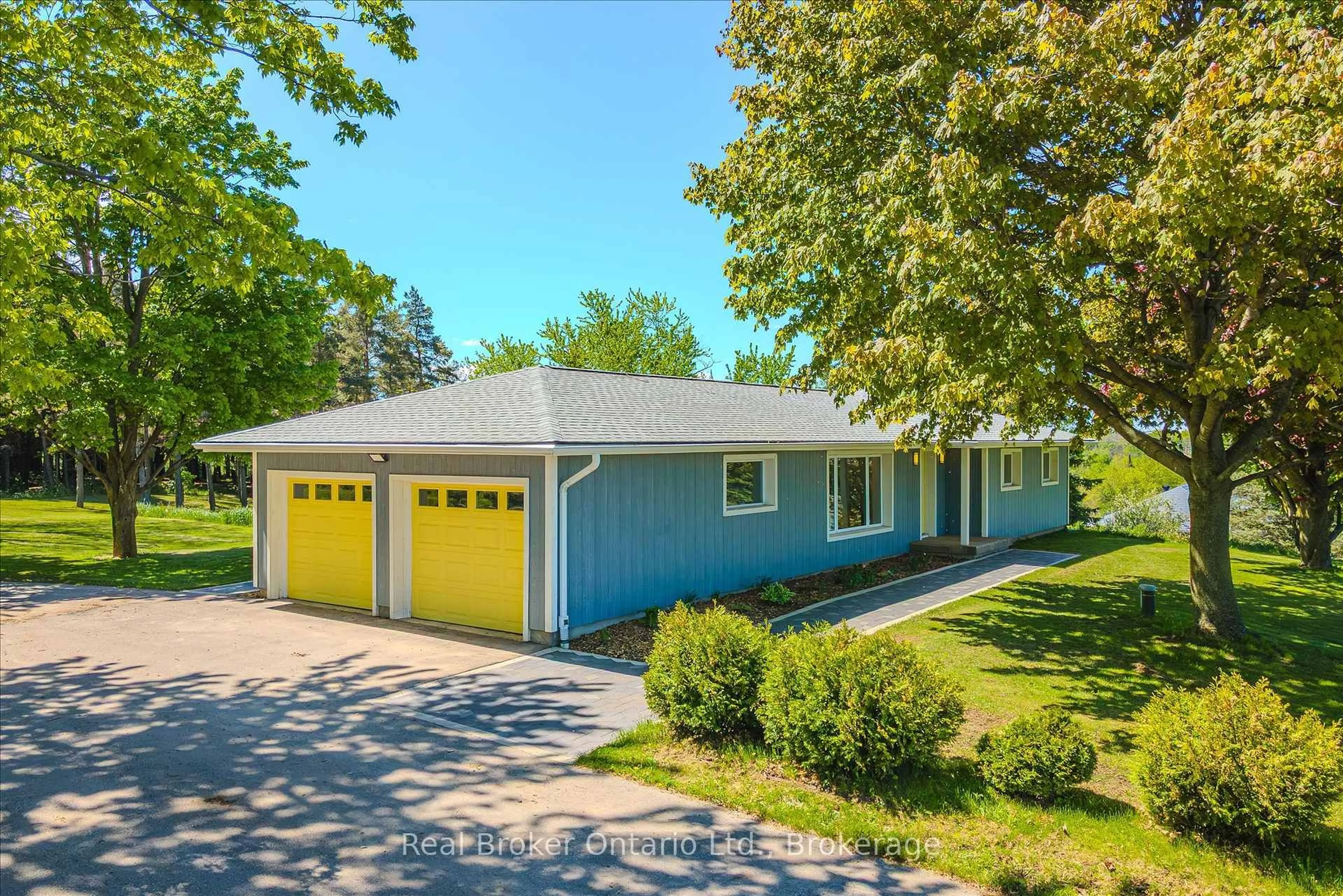 Home with vinyl exterior material, street for 9435 Wellington Road 22, Erin Ontario N0B 1Z0