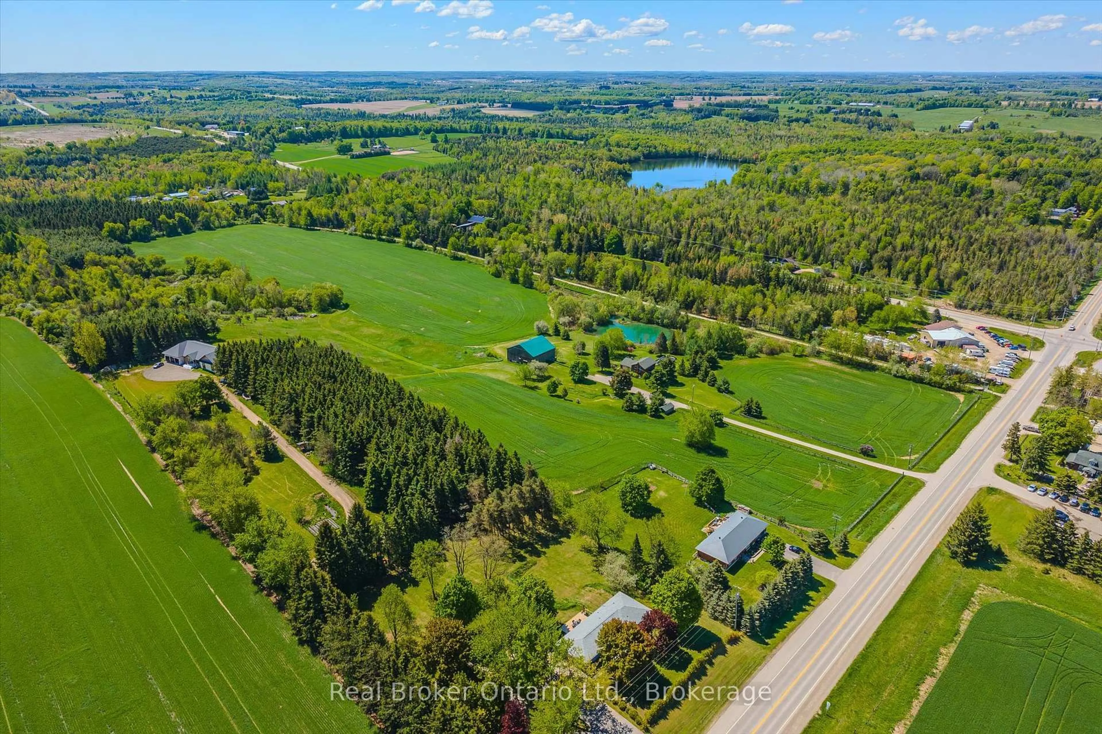 A pic from outside/outdoor area/front of a property/back of a property/a pic from drone, water/lake/river/ocean view for 9435 Wellington Road 22, Erin Ontario N0B 1Z0