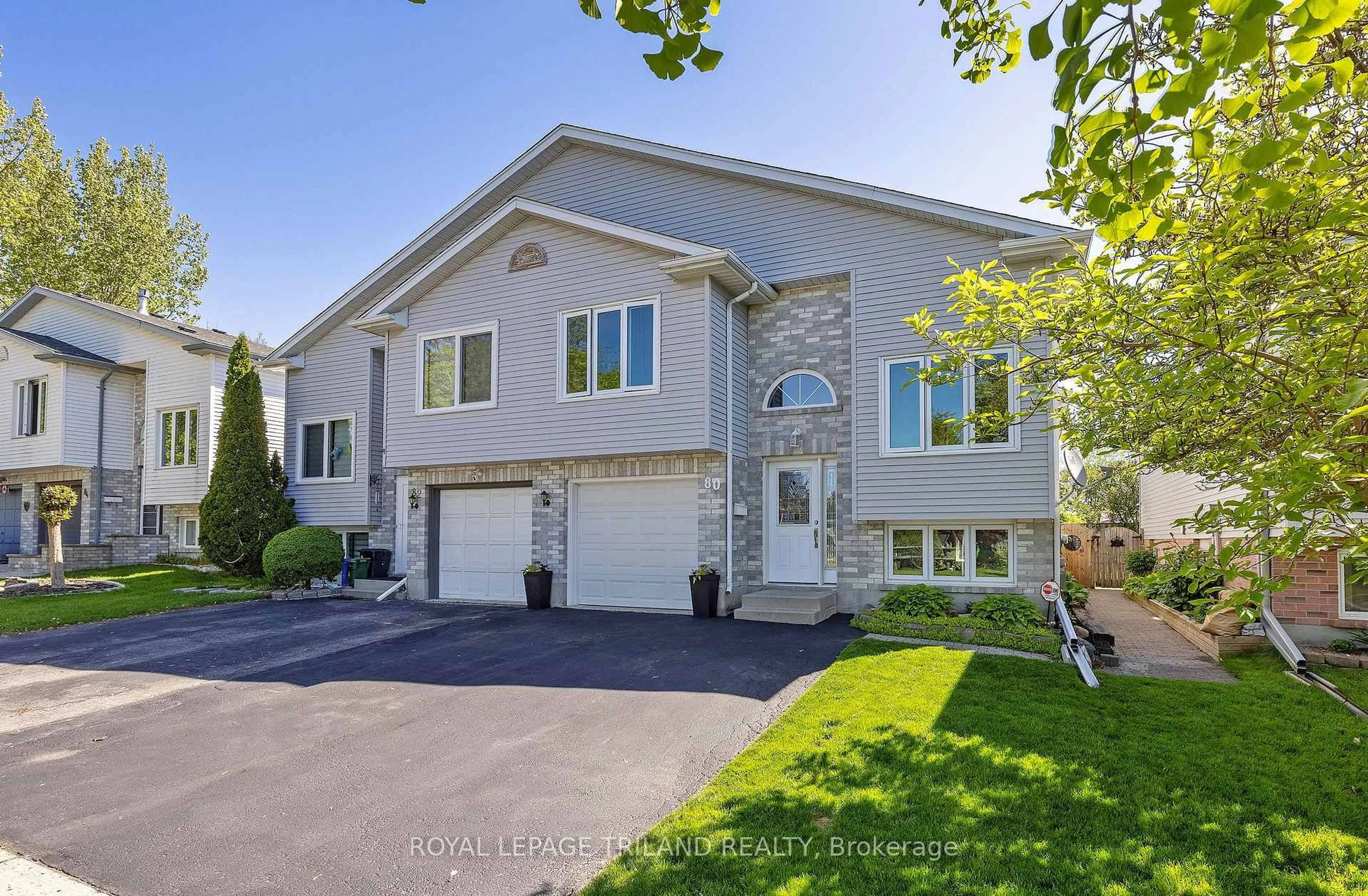 Home with vinyl exterior material, street for 80 Tanner Dr, London East Ontario N5W 6B5
