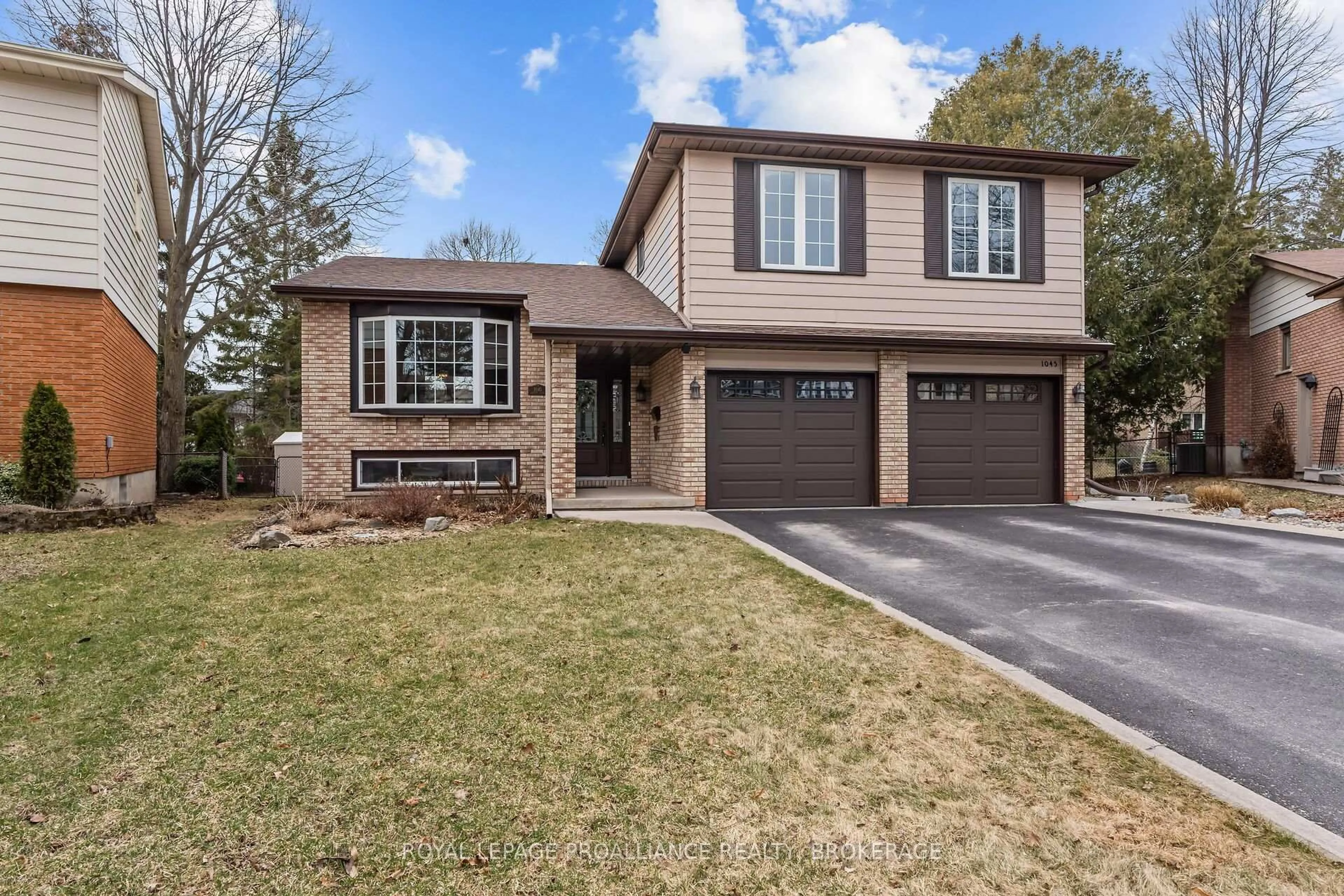 Home with brick exterior material, street for 1045 Lawton Pl, Kingston Ontario K7P 1M2
