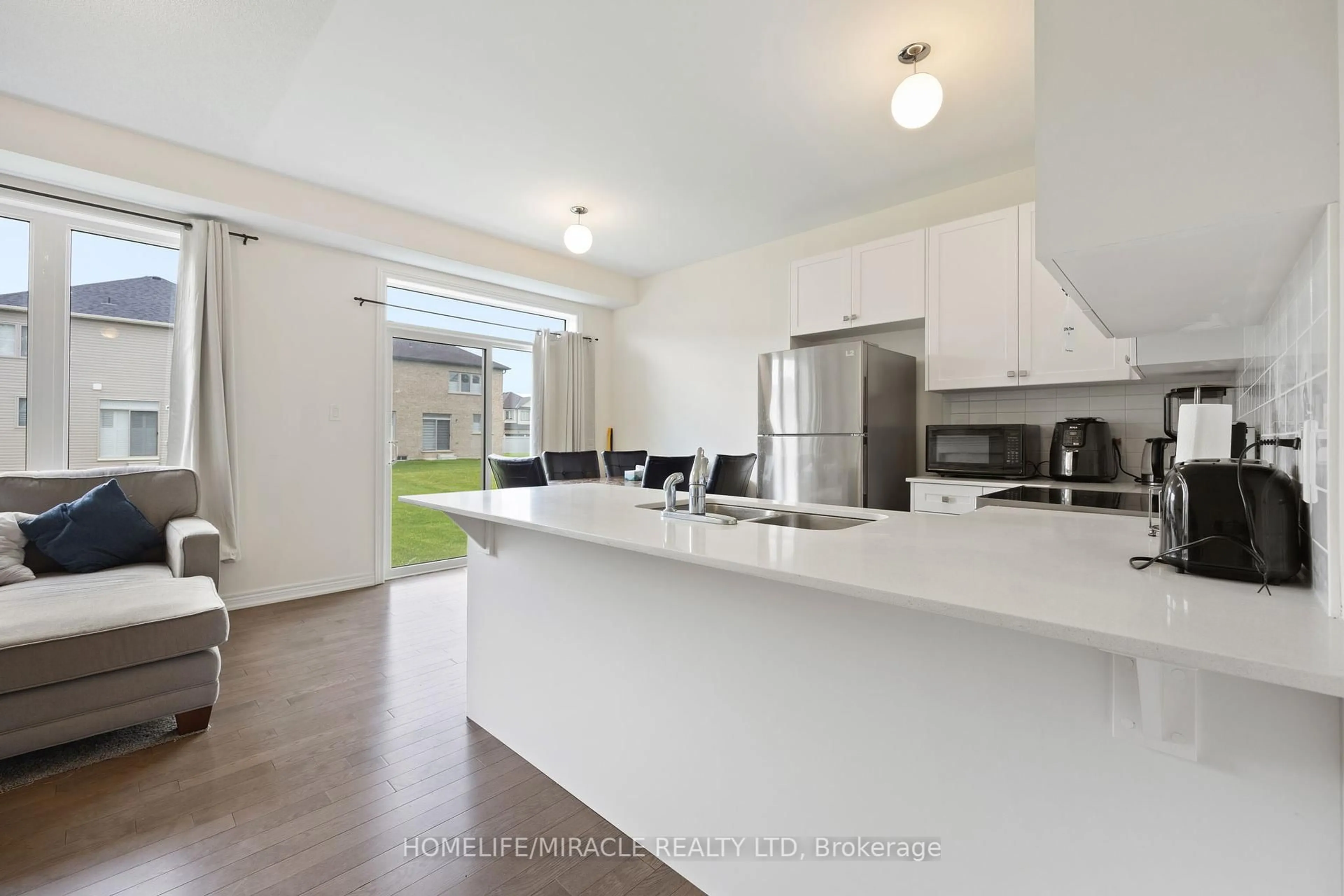 Open concept kitchen, unknown for 479 Black Cherry Cres, Shelburne Ontario L9V 3Y6