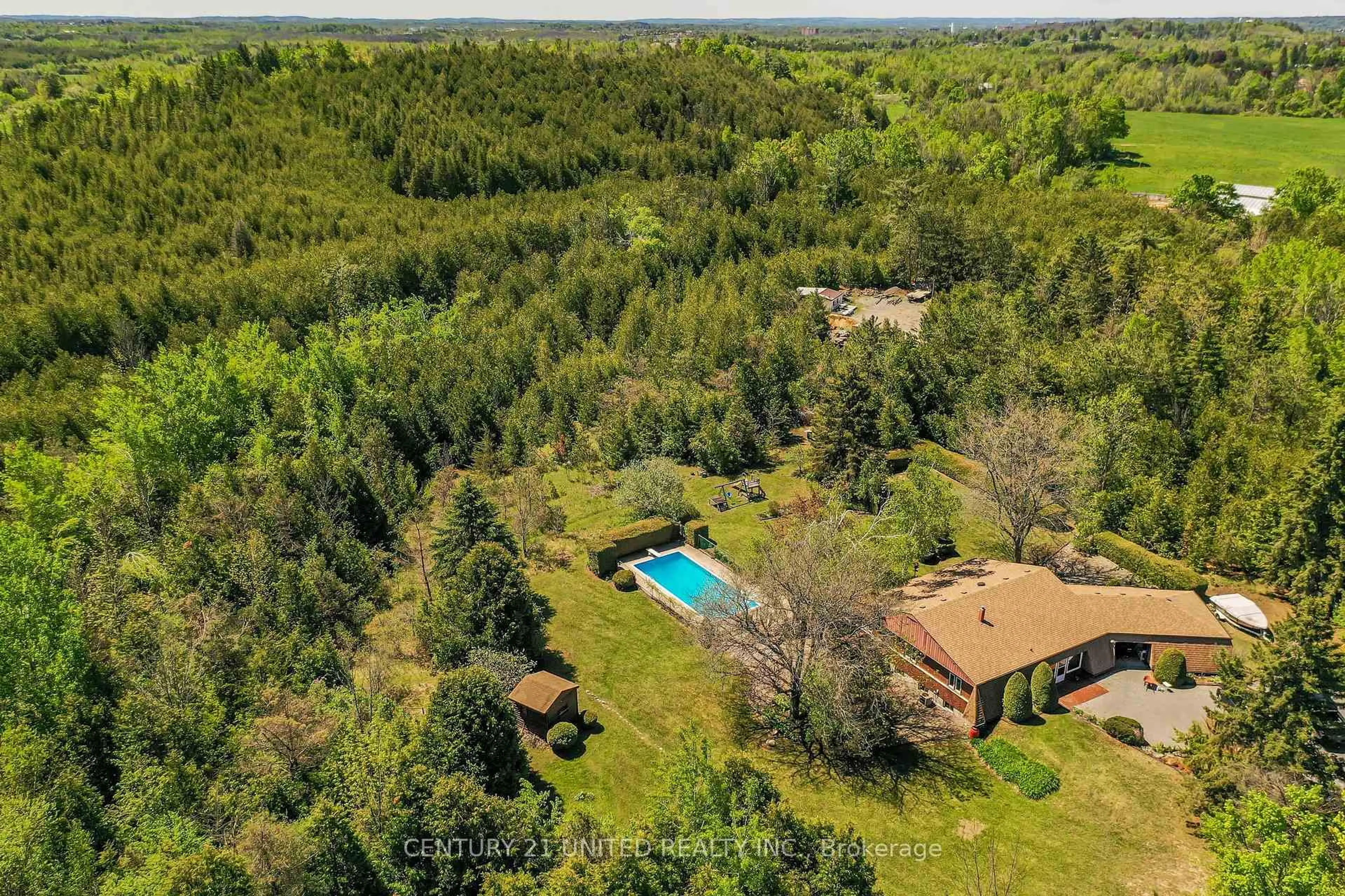 A pic from outside/outdoor area/front of a property/back of a property/a pic from drone, forest/trees view for 201 County Road 4 Rd, Douro-Dummer Ontario K9J 6Y1