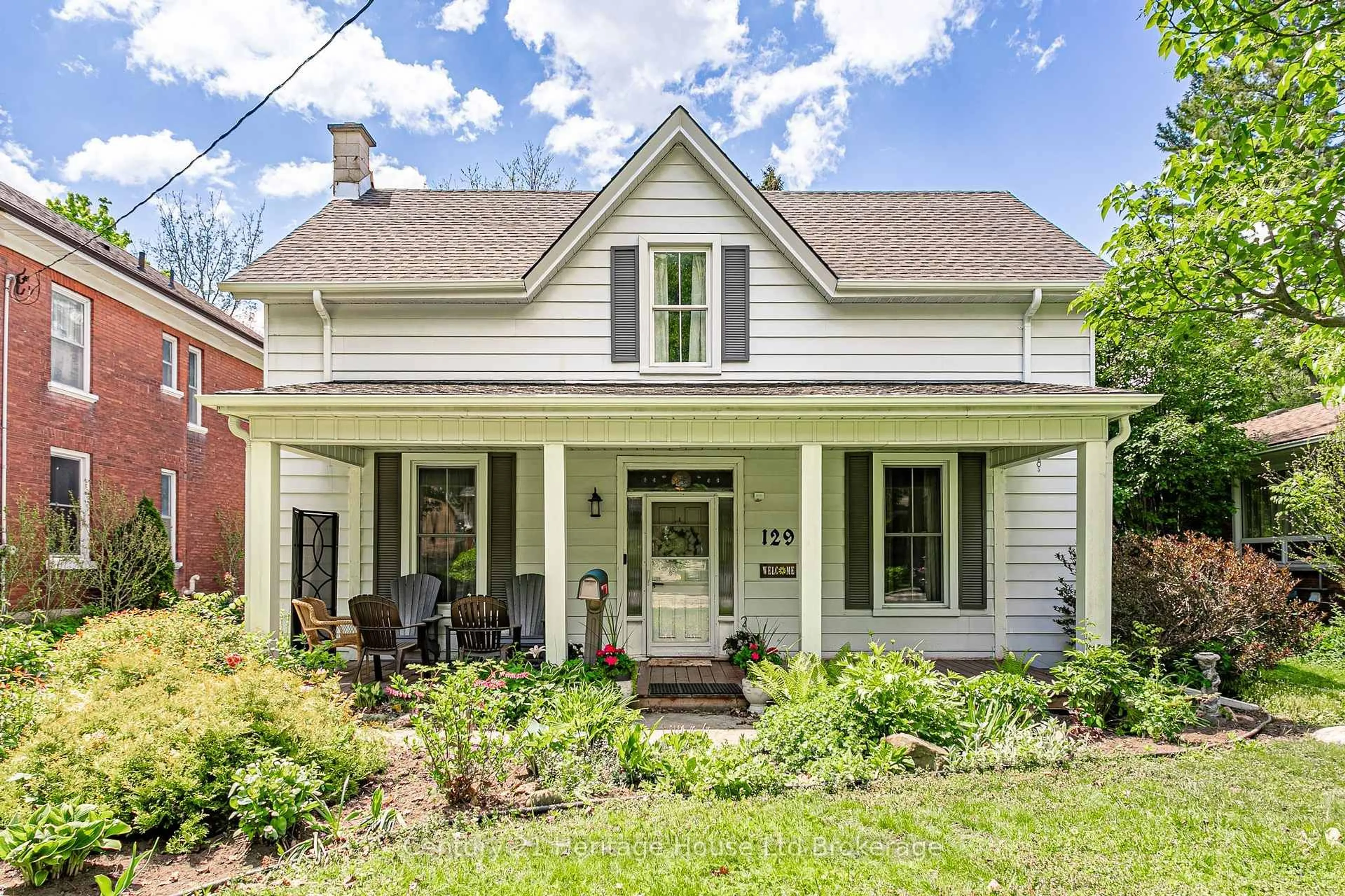 Home with vinyl exterior material, street for 129 Delatre St, Woodstock Ontario N4S 6C1