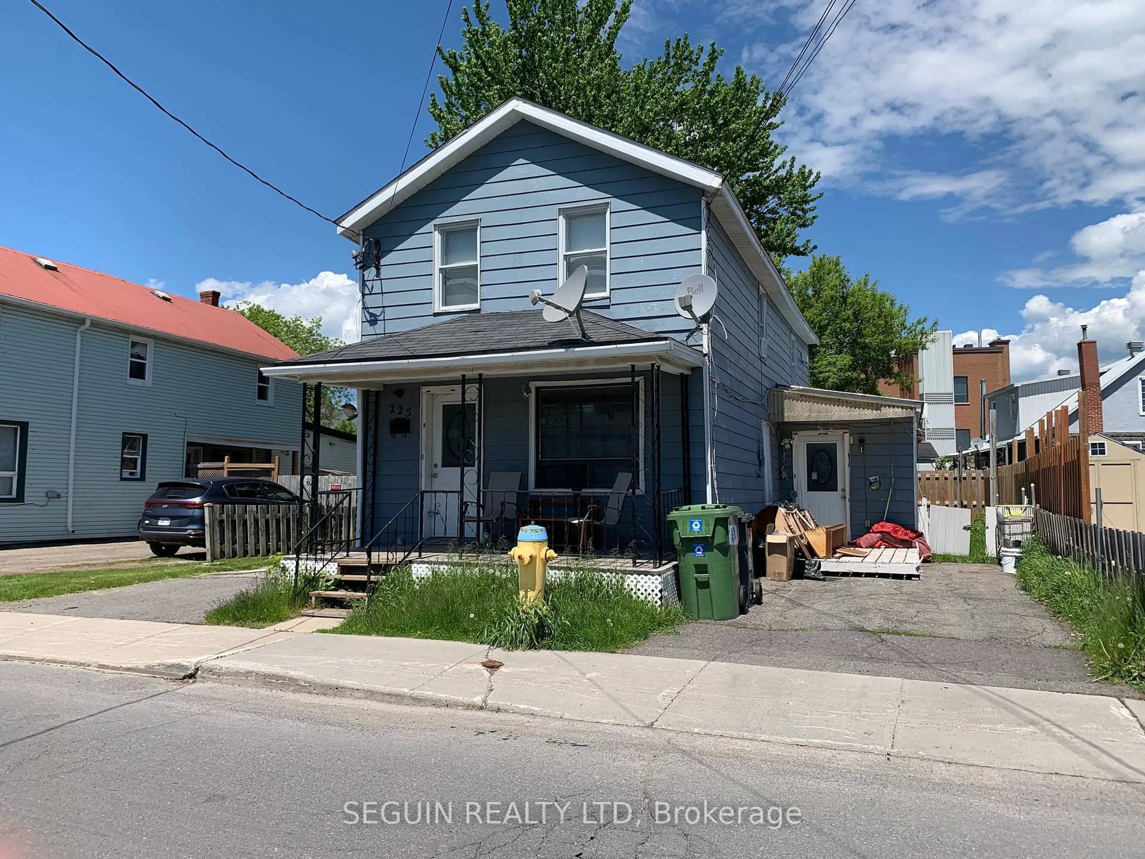 A pic from outside/outdoor area/front of a property/back of a property/a pic from drone, street for 223-225 Higginson St, Hawkesbury Ontario K6A 1G6