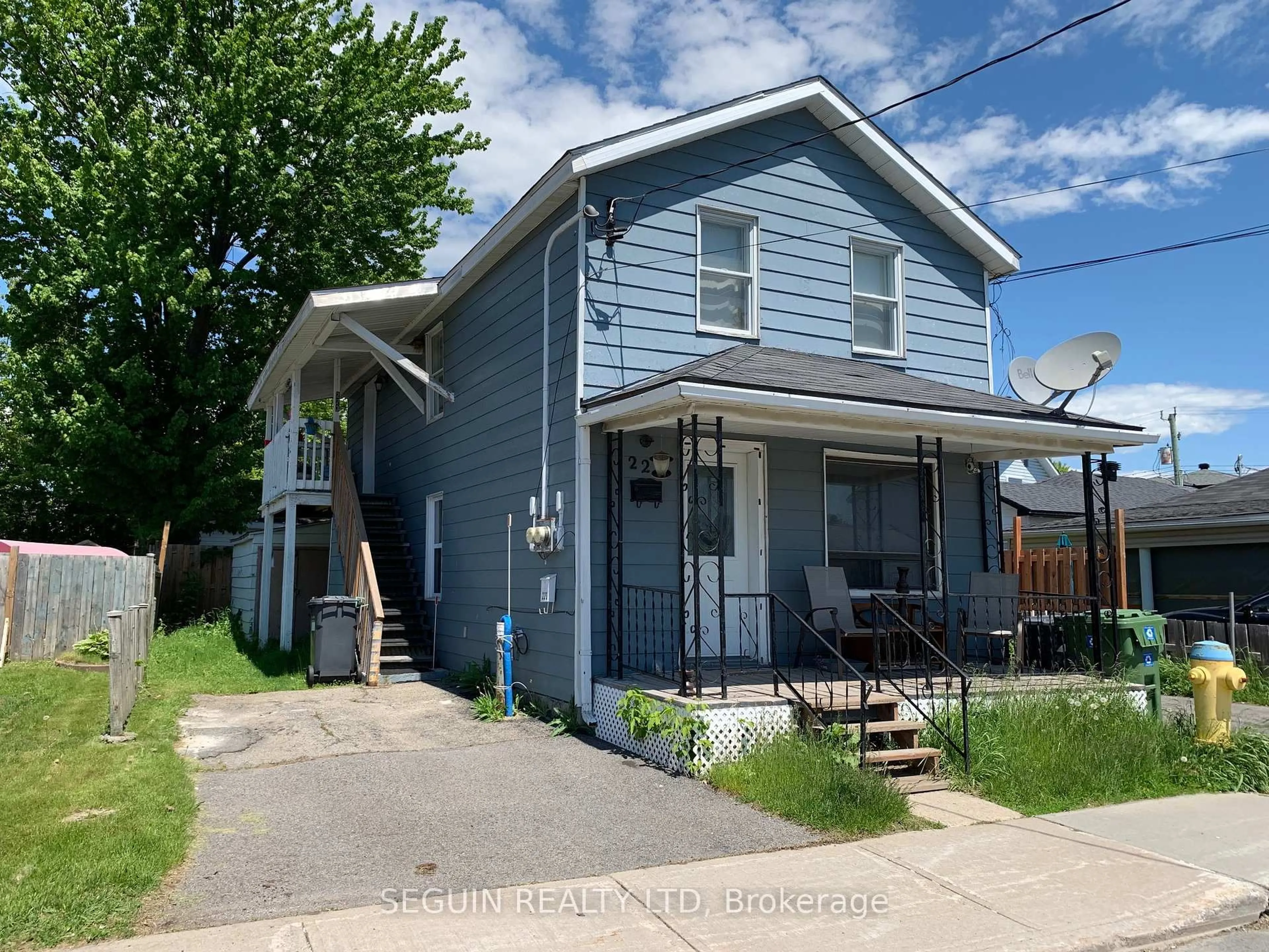 A pic from outside/outdoor area/front of a property/back of a property/a pic from drone, street for 223-225 Higginson St, Hawkesbury Ontario K6A 1G6