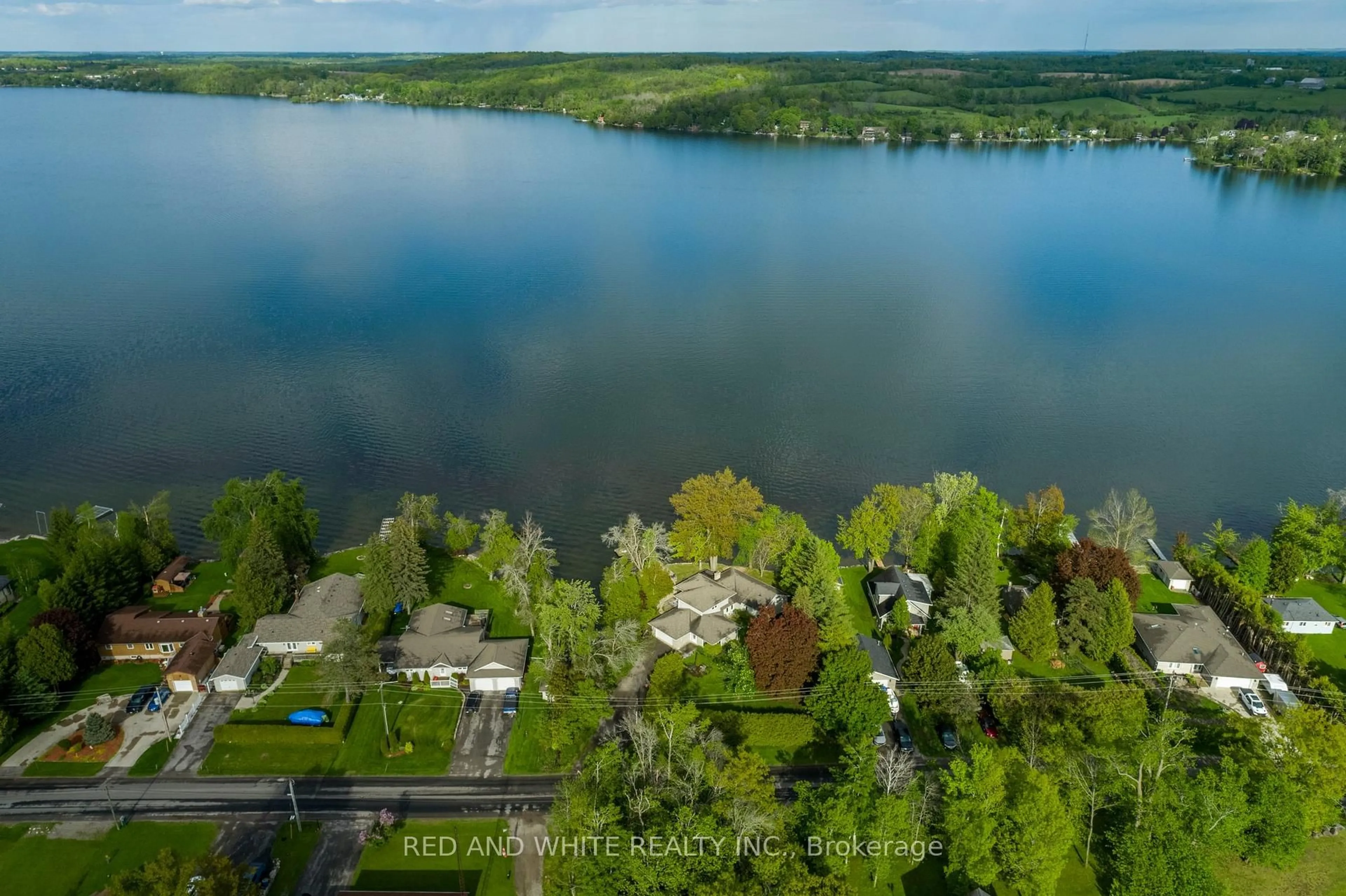 A pic from outside/outdoor area/front of a property/back of a property/a pic from drone, water/lake/river/ocean view for 409 Gifford Dr, Selwyn Ontario K9J 6X2
