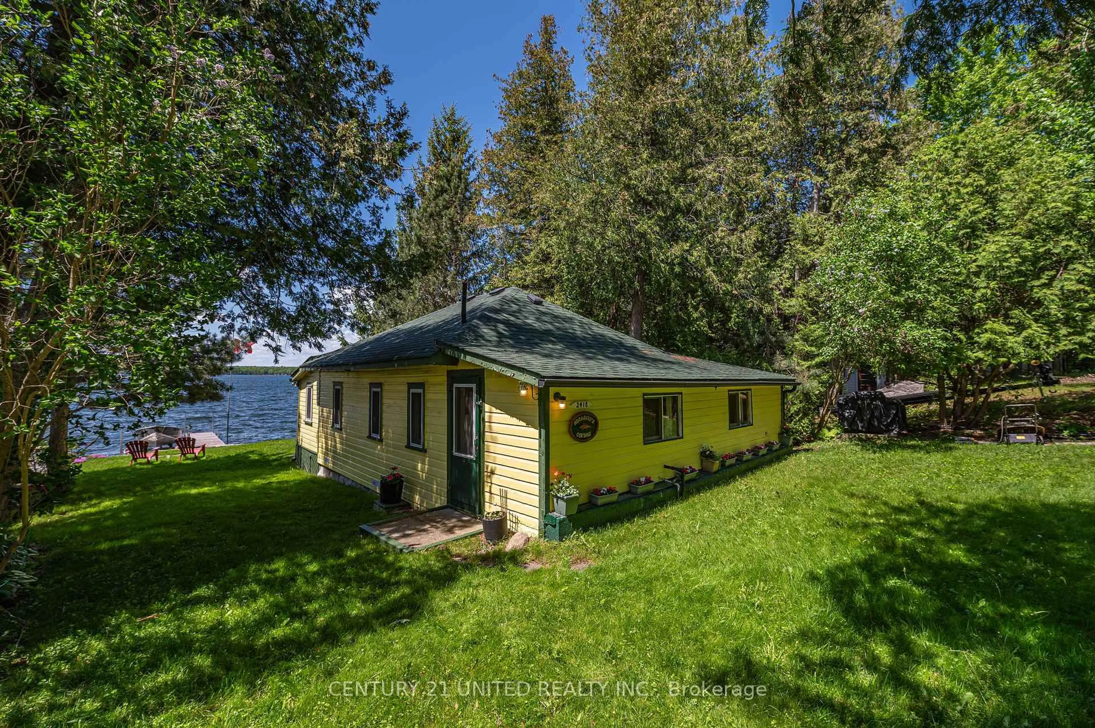 A pic from outside/outdoor area/front of a property/back of a property/a pic from drone, water/lake/river/ocean view for 2418 Upper Chemung Dr, Selwyn Ontario K0L 2H0