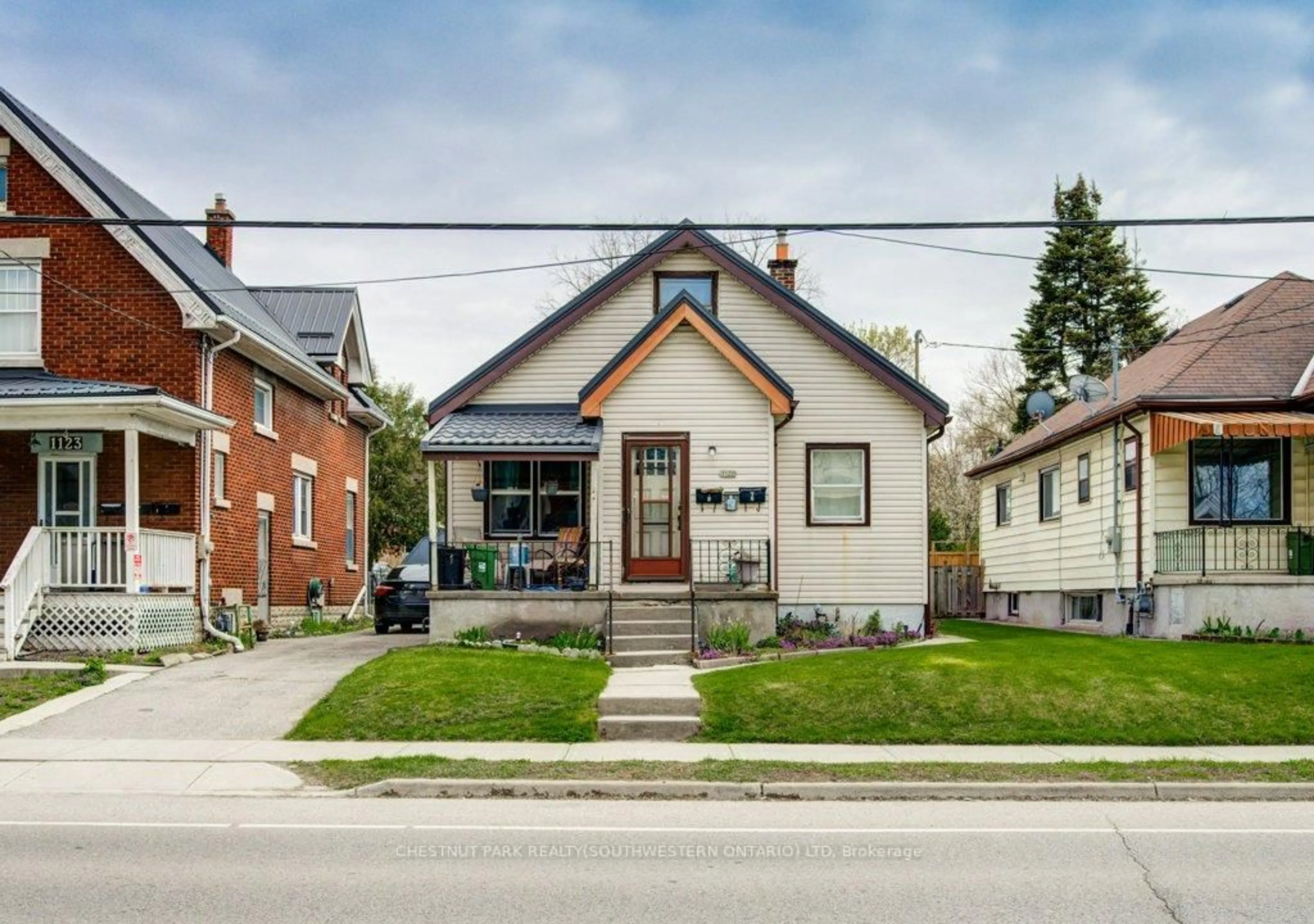 Home with brick exterior material, street for 1121 Trafalgar St, London East Ontario N5Z 1G9