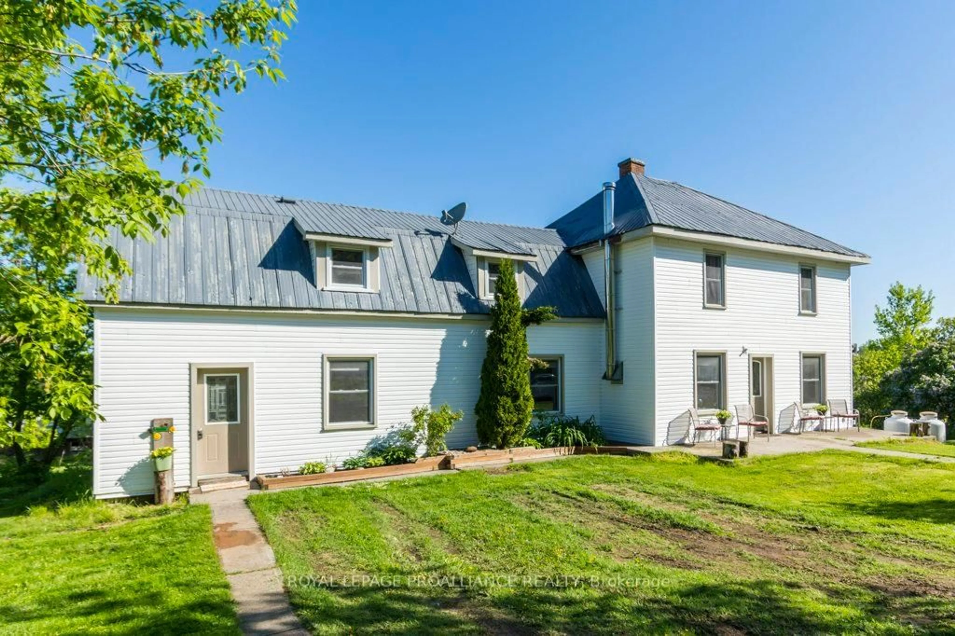 A pic from outside/outdoor area/front of a property/back of a property/a pic from drone, street for 1780 Victoria Rd, Prince Edward County Ontario K0K 1L0
