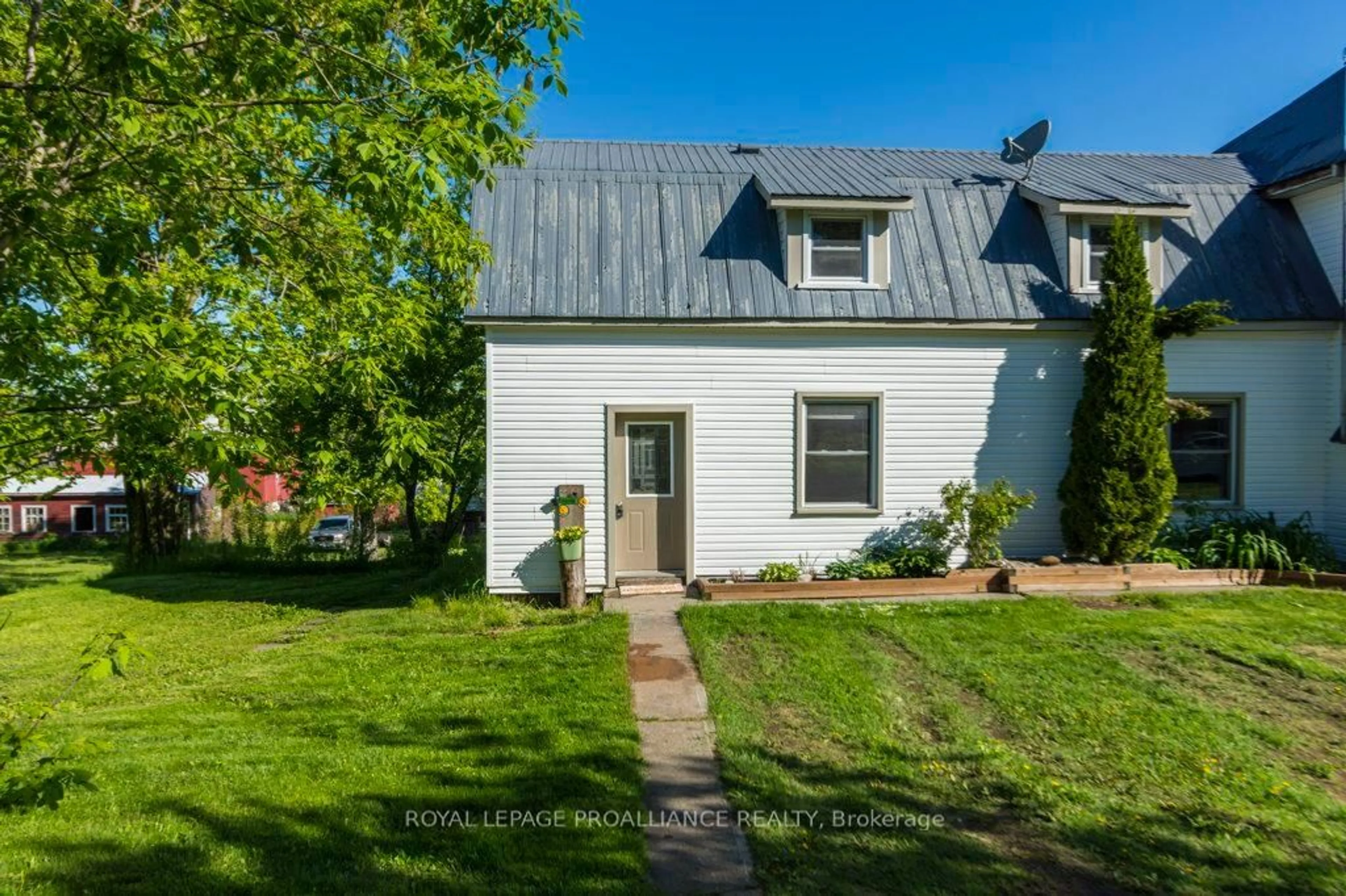 A pic from outside/outdoor area/front of a property/back of a property/a pic from drone, street for 1780 Victoria Rd, Prince Edward County Ontario K0K 1L0