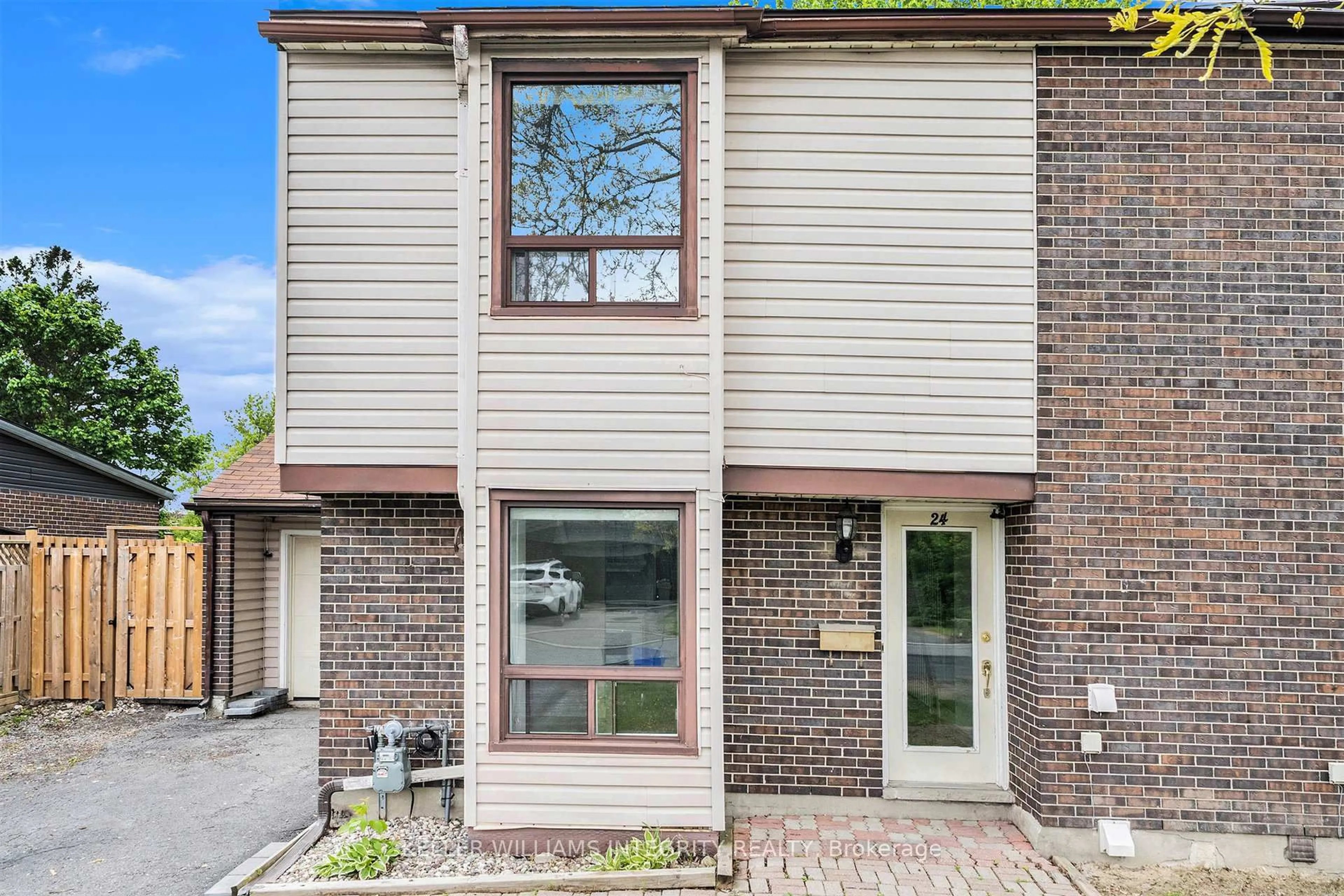 Home with brick exterior material, street for 24 Elvaston Ave, Ottawa Ontario K2G 3T4