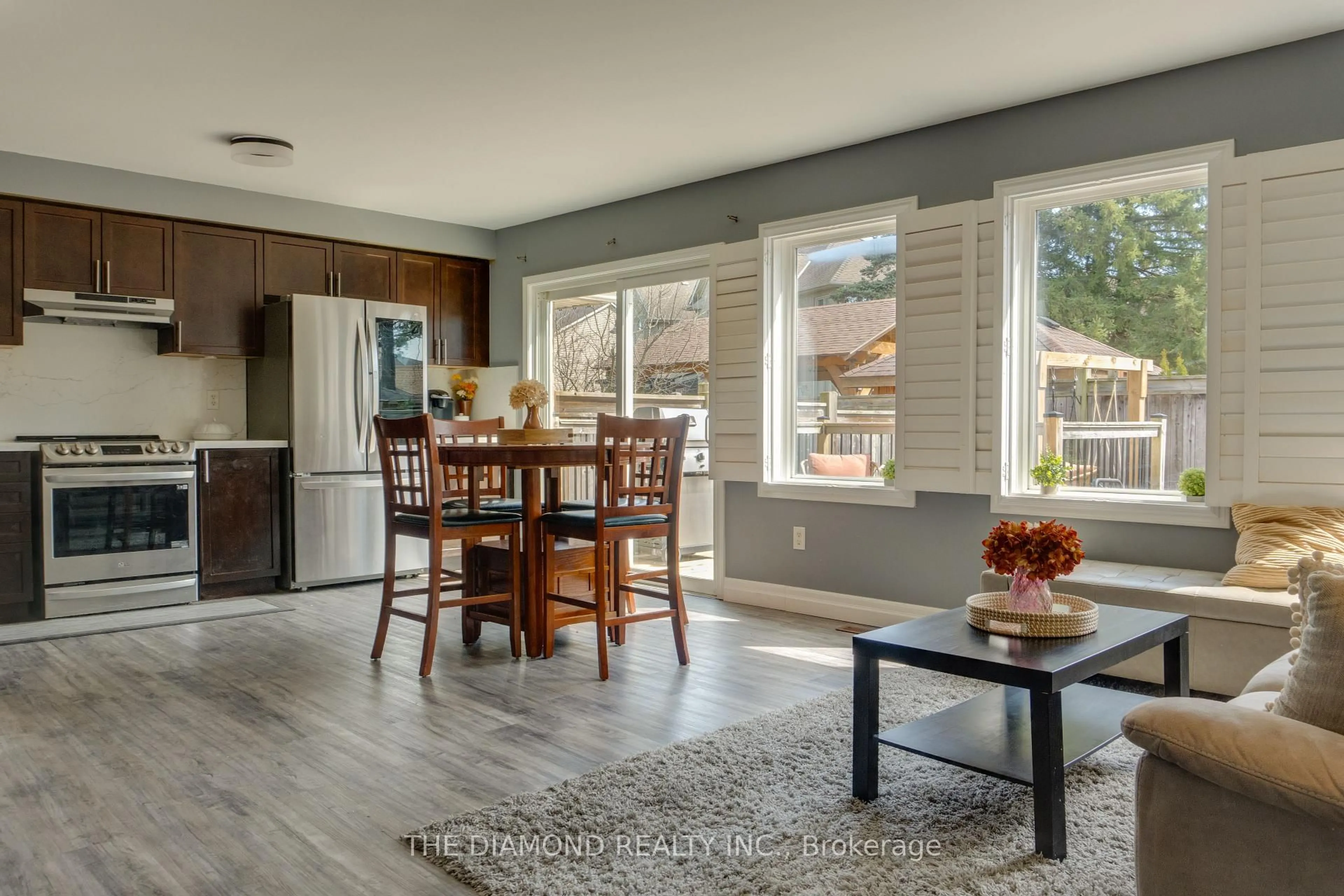 Open concept kitchen, wood/laminate floor for 82 Blackbird Circ, Cambridge Ontario N3C 0B1