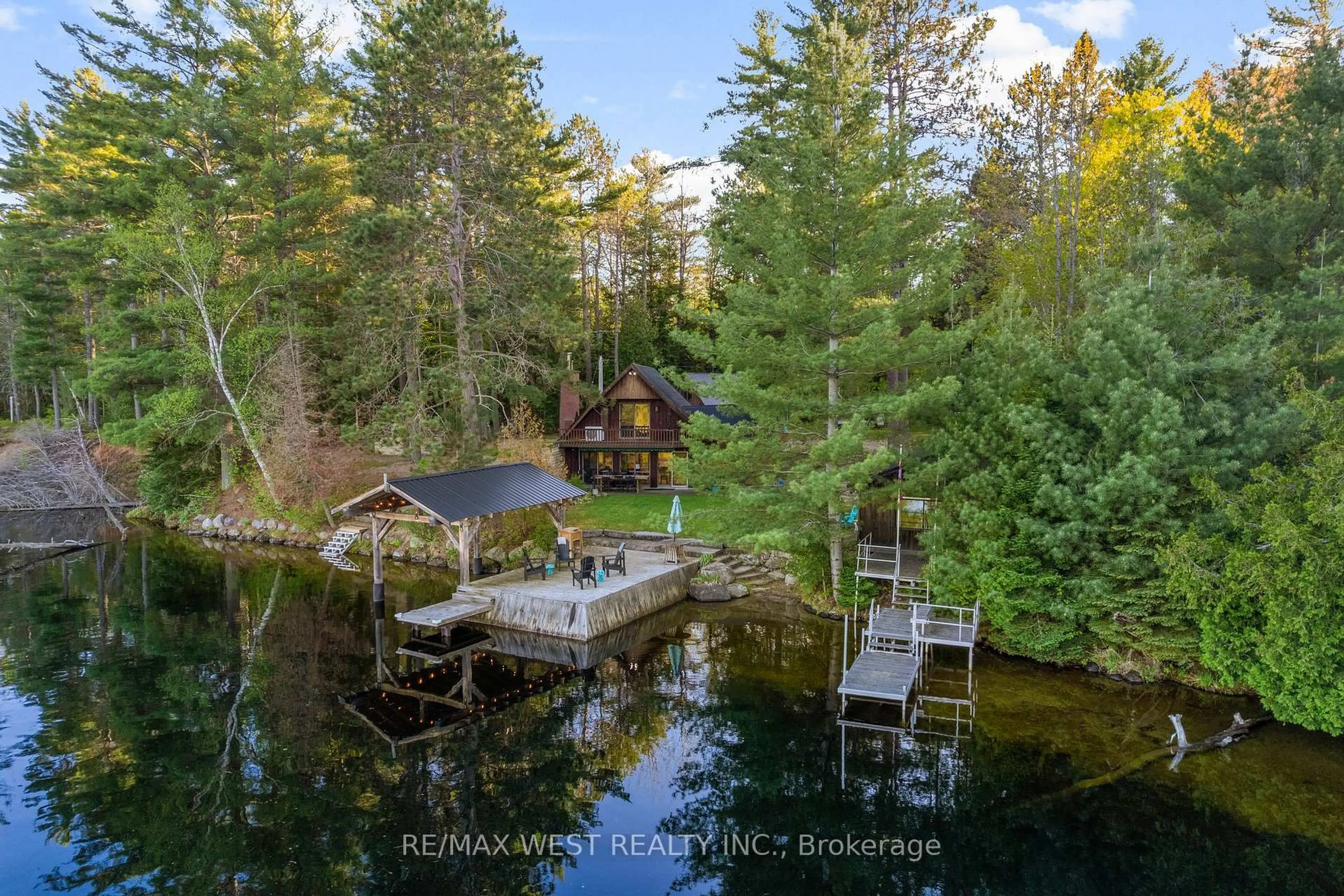 A pic from outside/outdoor area/front of a property/back of a property/a pic from drone, water/lake/river/ocean view for 440 Ohio Rd, Combermere Ontario K0J 1L0