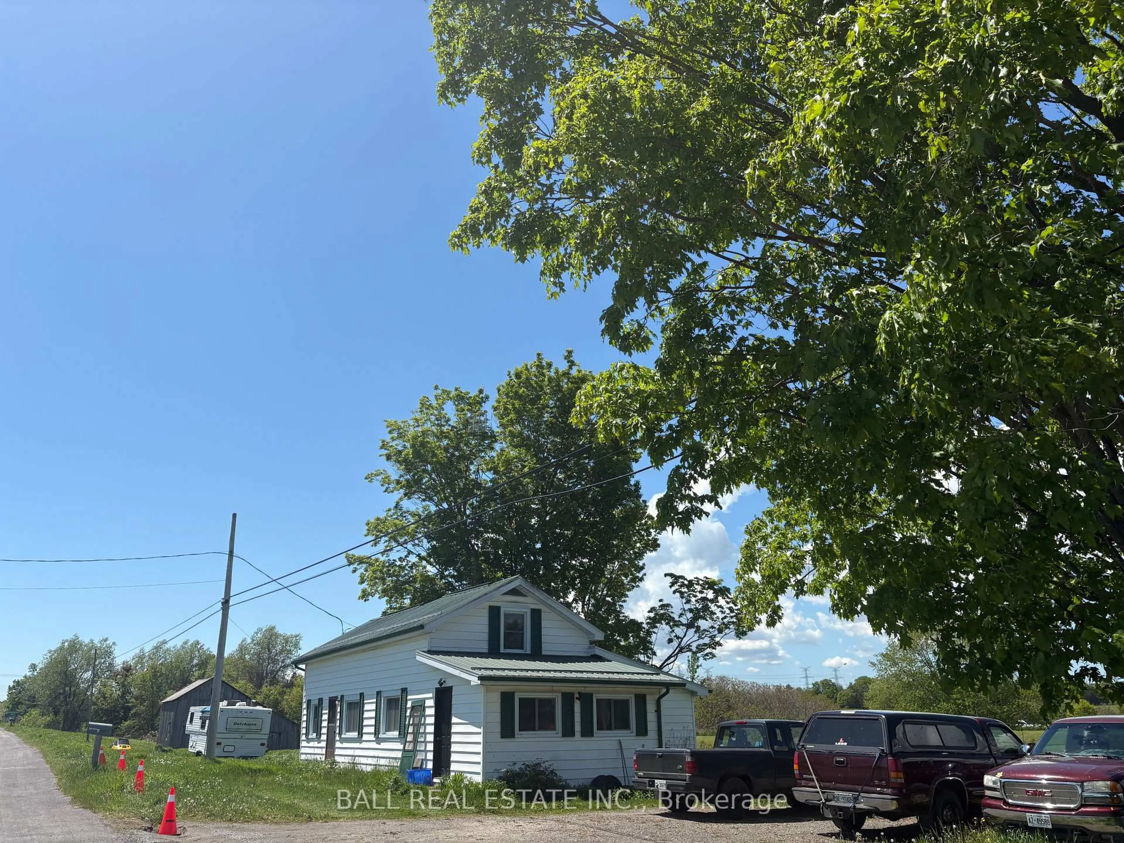 A pic from outside/outdoor area/front of a property/back of a property/a pic from drone, street for 1974 County Road 2, Port Hope Ontario L1A 3V7