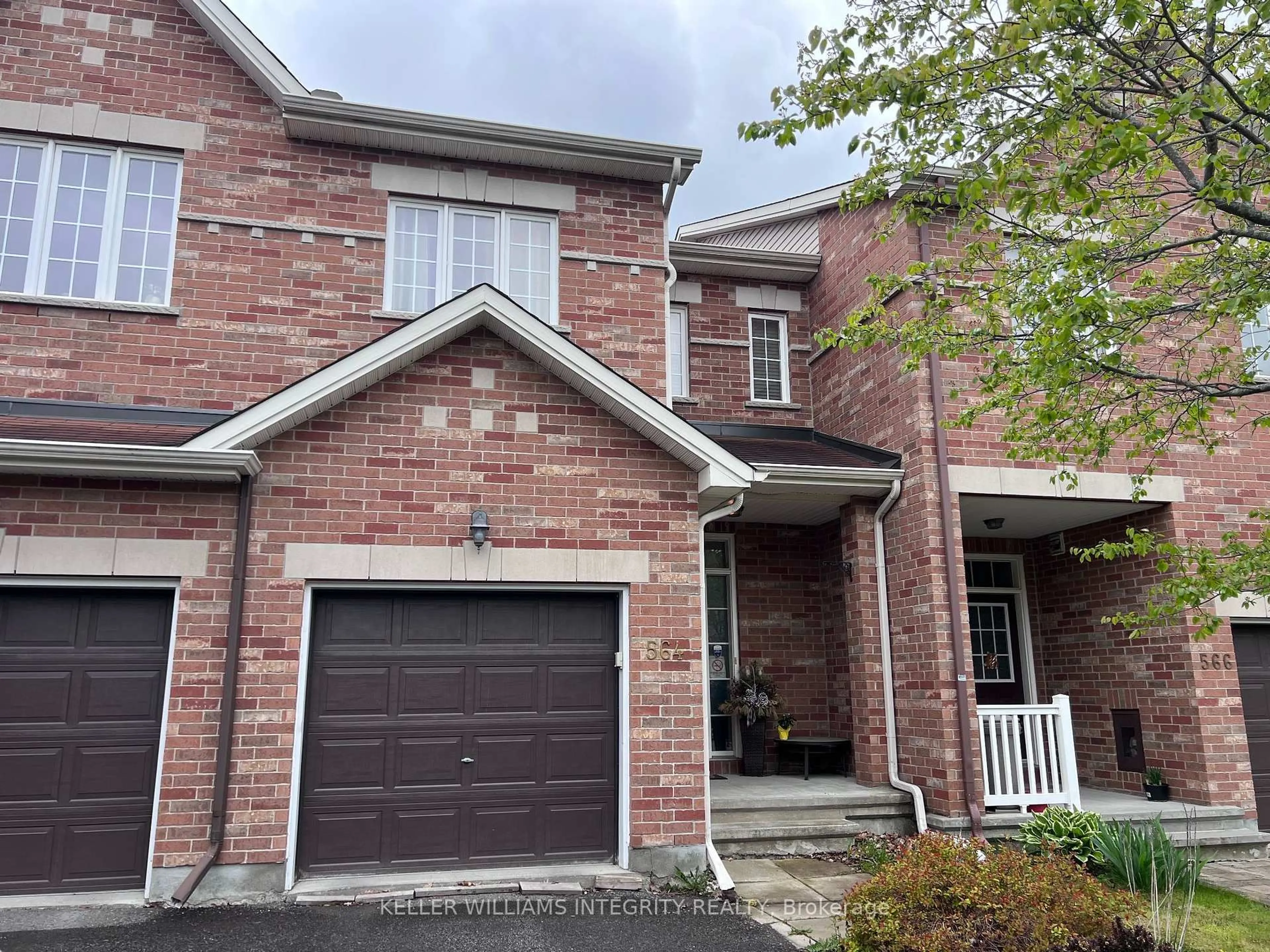 Home with brick exterior material, street for 564 Remnor Ave, Ottawa Ontario K2T 0A5