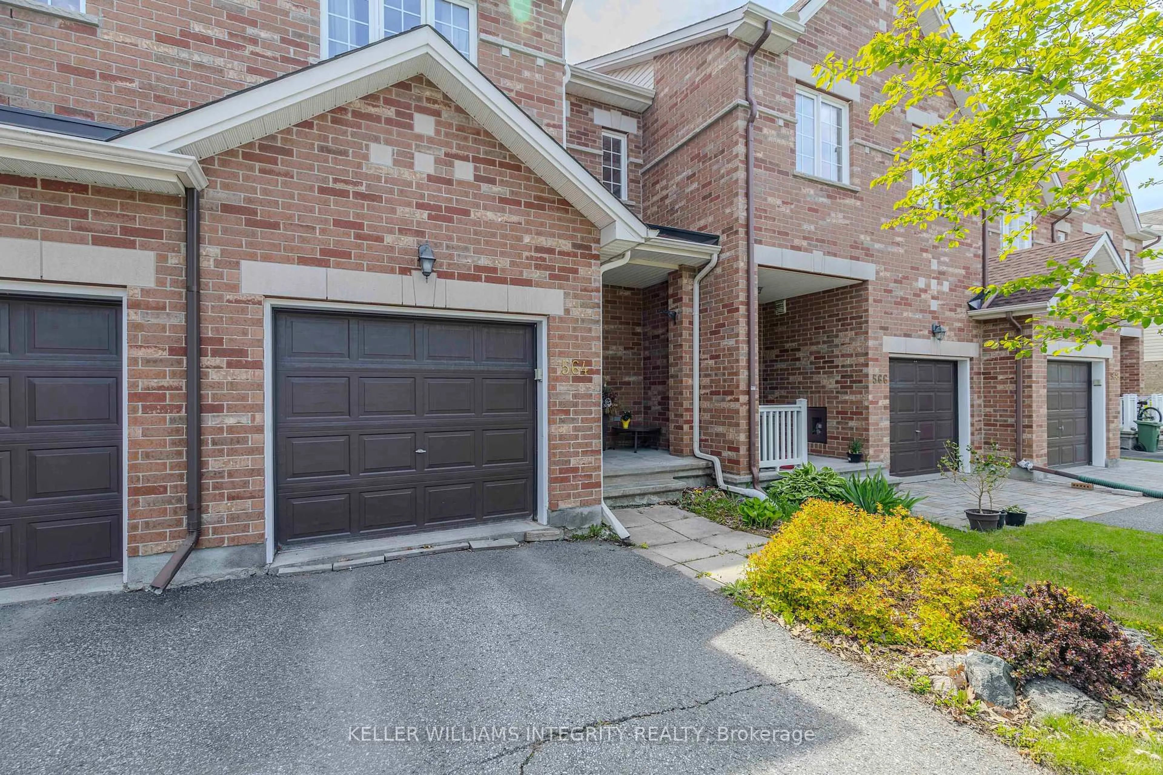 Home with brick exterior material, street for 564 Remnor Ave, Ottawa Ontario K2T 0A5