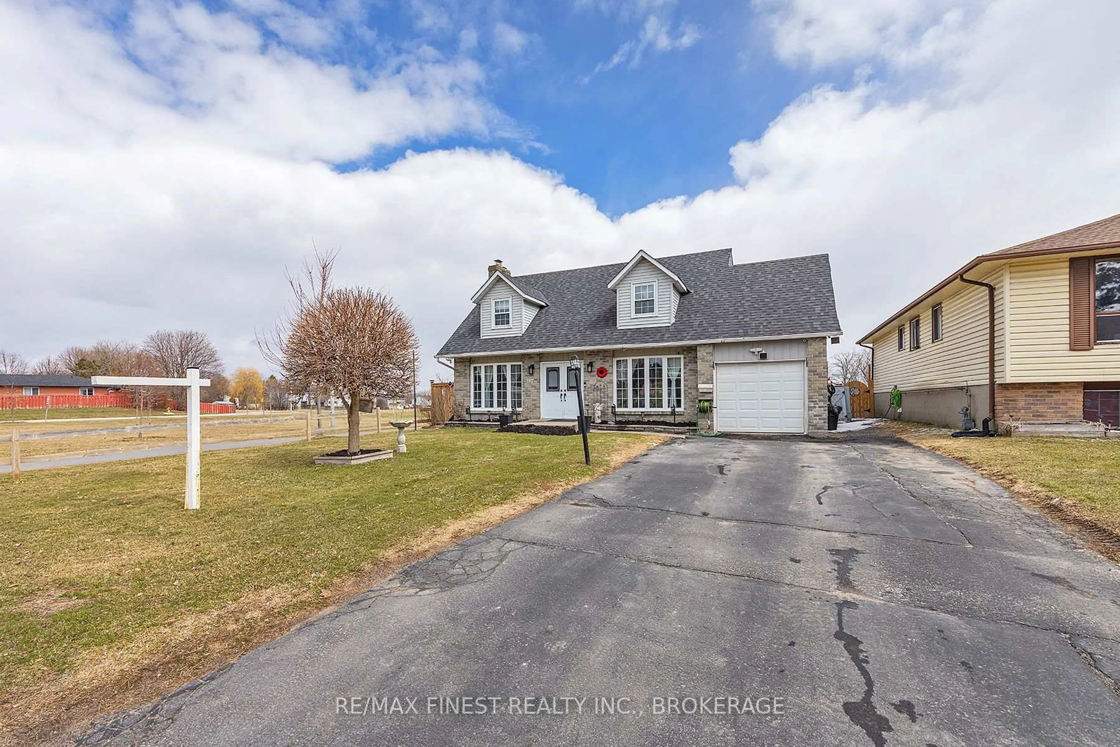 A pic from outside/outdoor area/front of a property/back of a property/a pic from drone, street for 187 Wilson St, Kingston Ontario K7K 5Y1