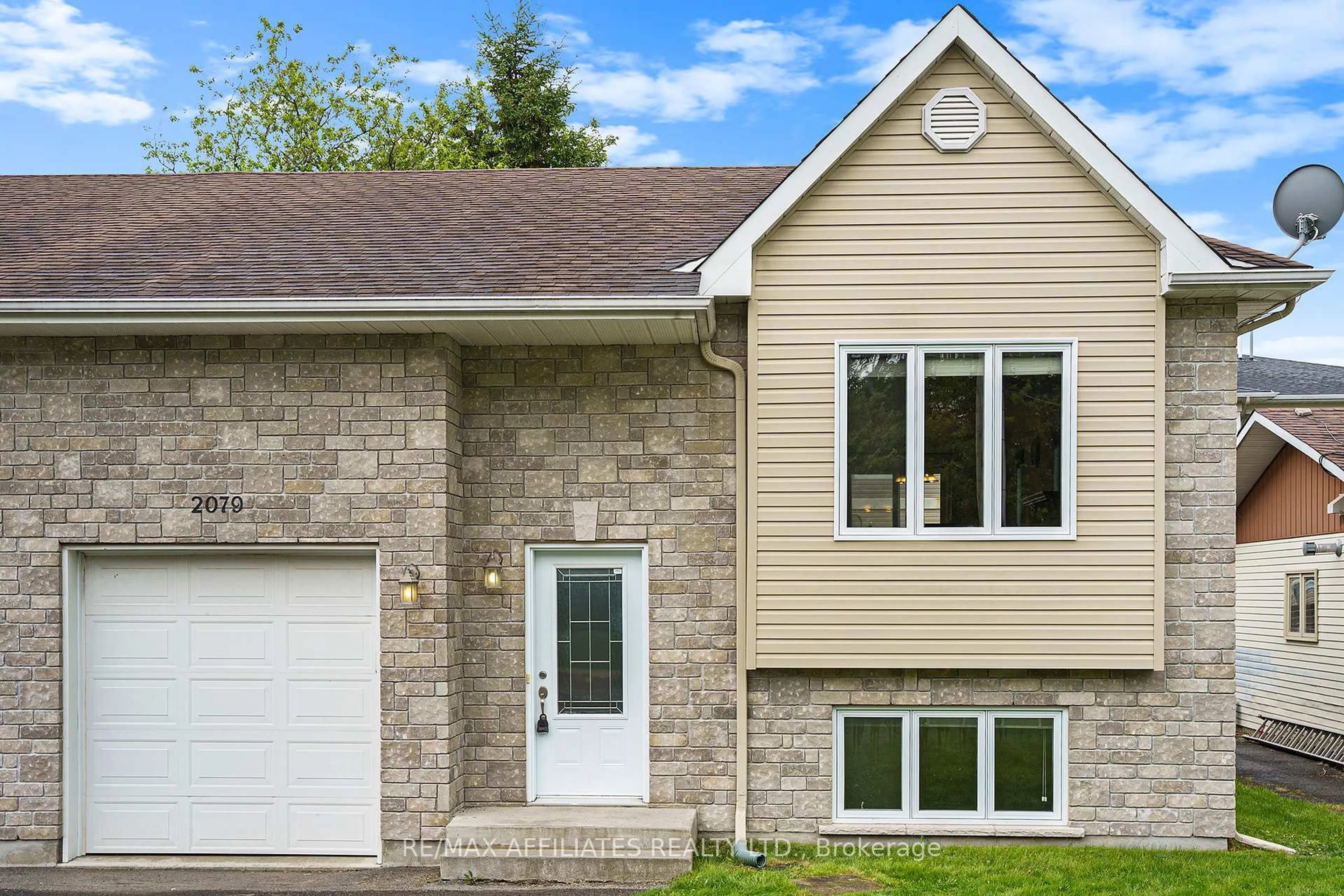 Home with vinyl exterior material, street for 2079 Des Pins St, The Nation Ontario K0A 2M0