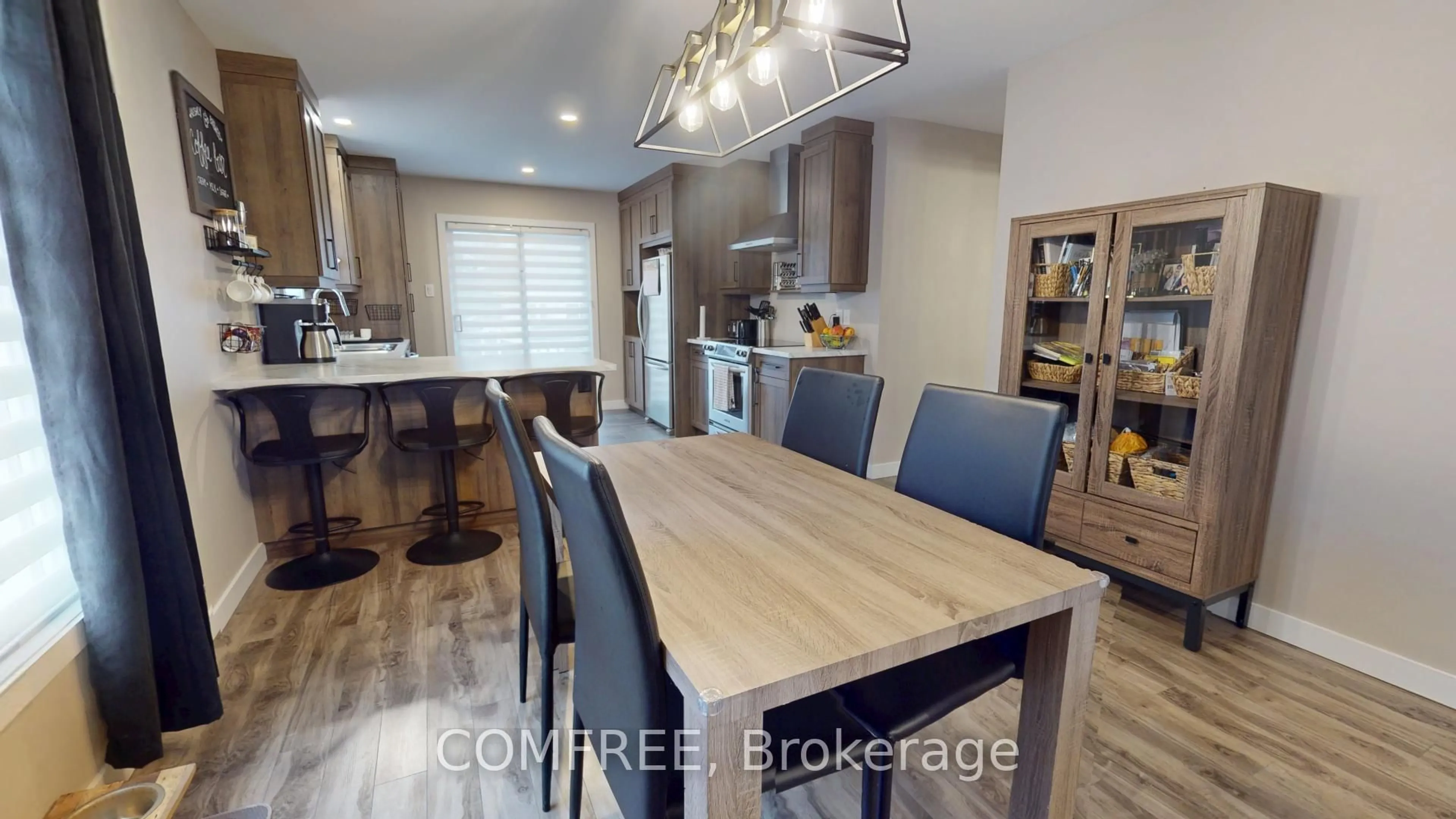 Open concept kitchen, wood/laminate floor for 208 Filion St, Russell Ontario K0A 1W0