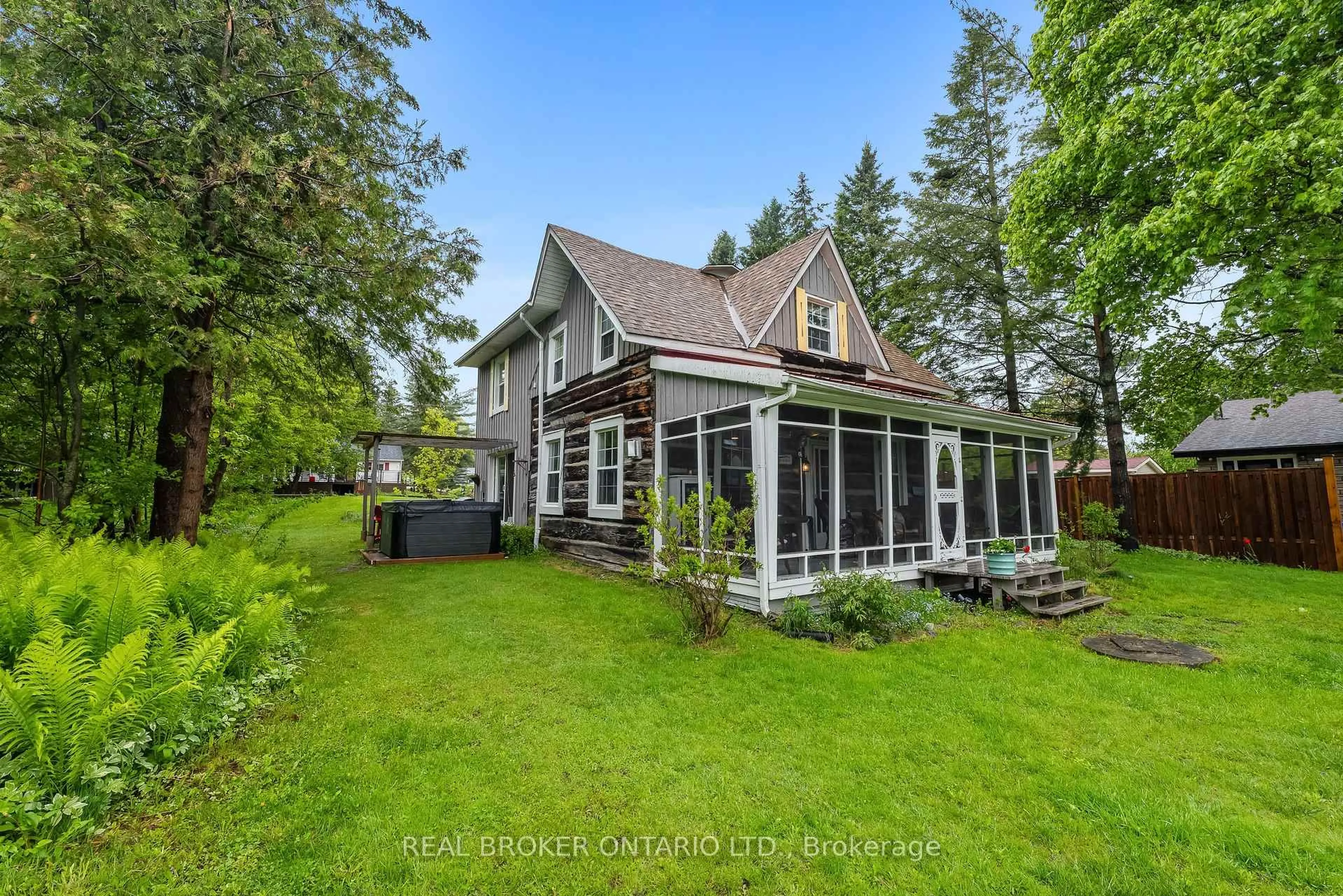 A pic from outside/outdoor area/front of a property/back of a property/a pic from drone, water/lake/river/ocean view for 70 Cowans Cres, Kawartha Lakes Ontario K0L 2W0