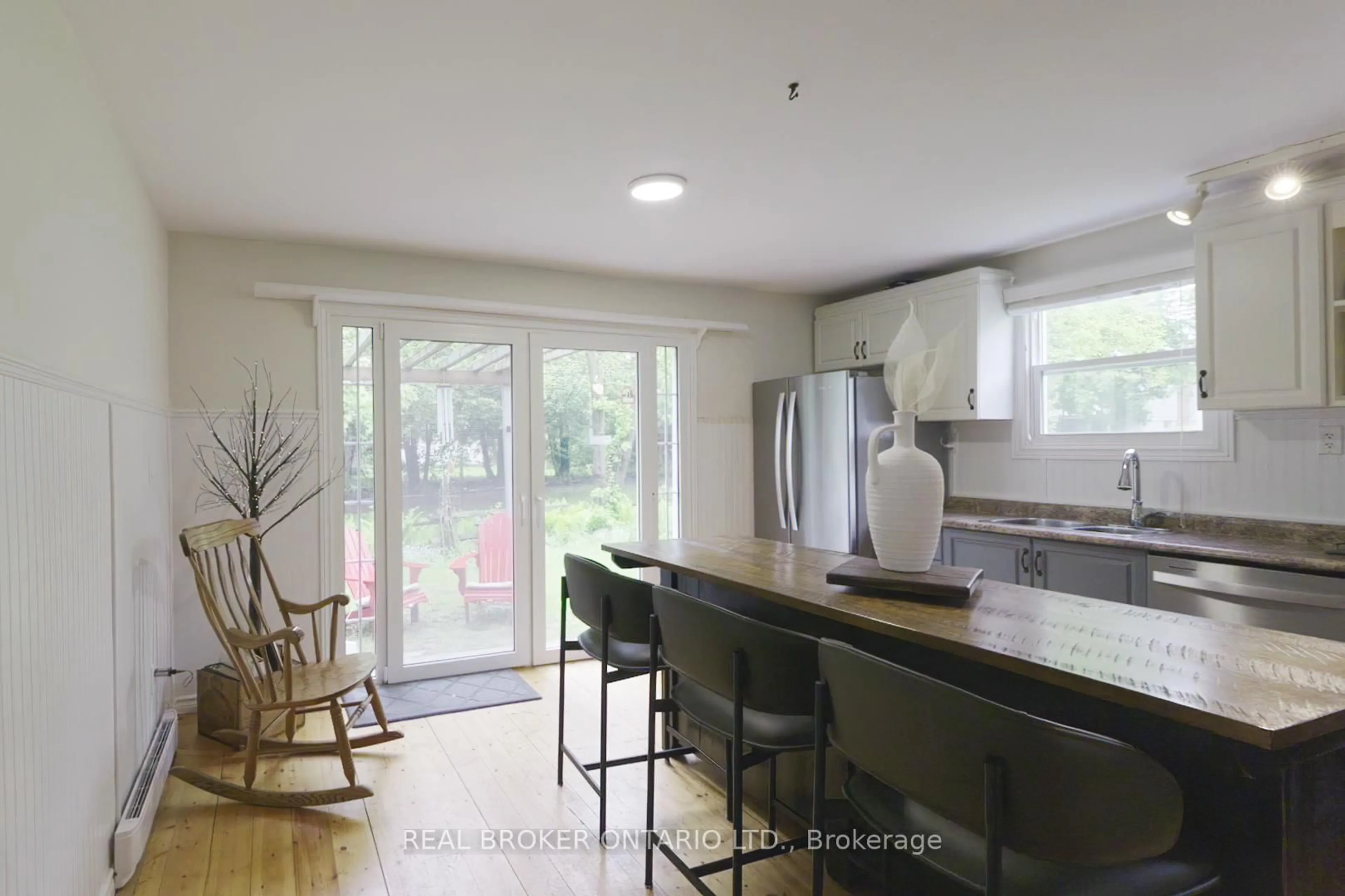 Open concept kitchen, wood/laminate floor for 70 Cowans Cres, Kawartha Lakes Ontario K0L 2W0