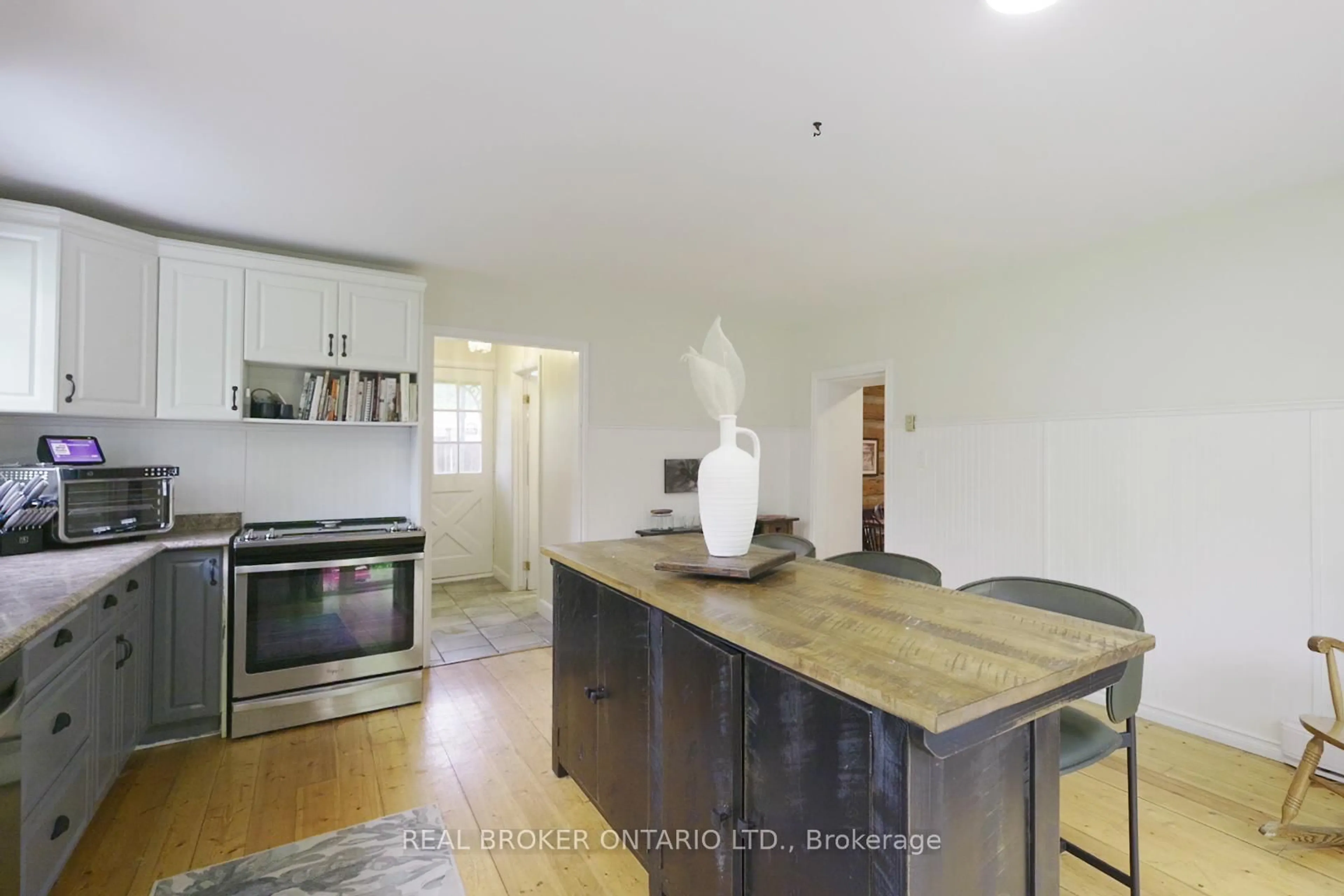 Open concept kitchen, wood/laminate floor for 70 Cowans Cres, Kawartha Lakes Ontario K0L 2W0