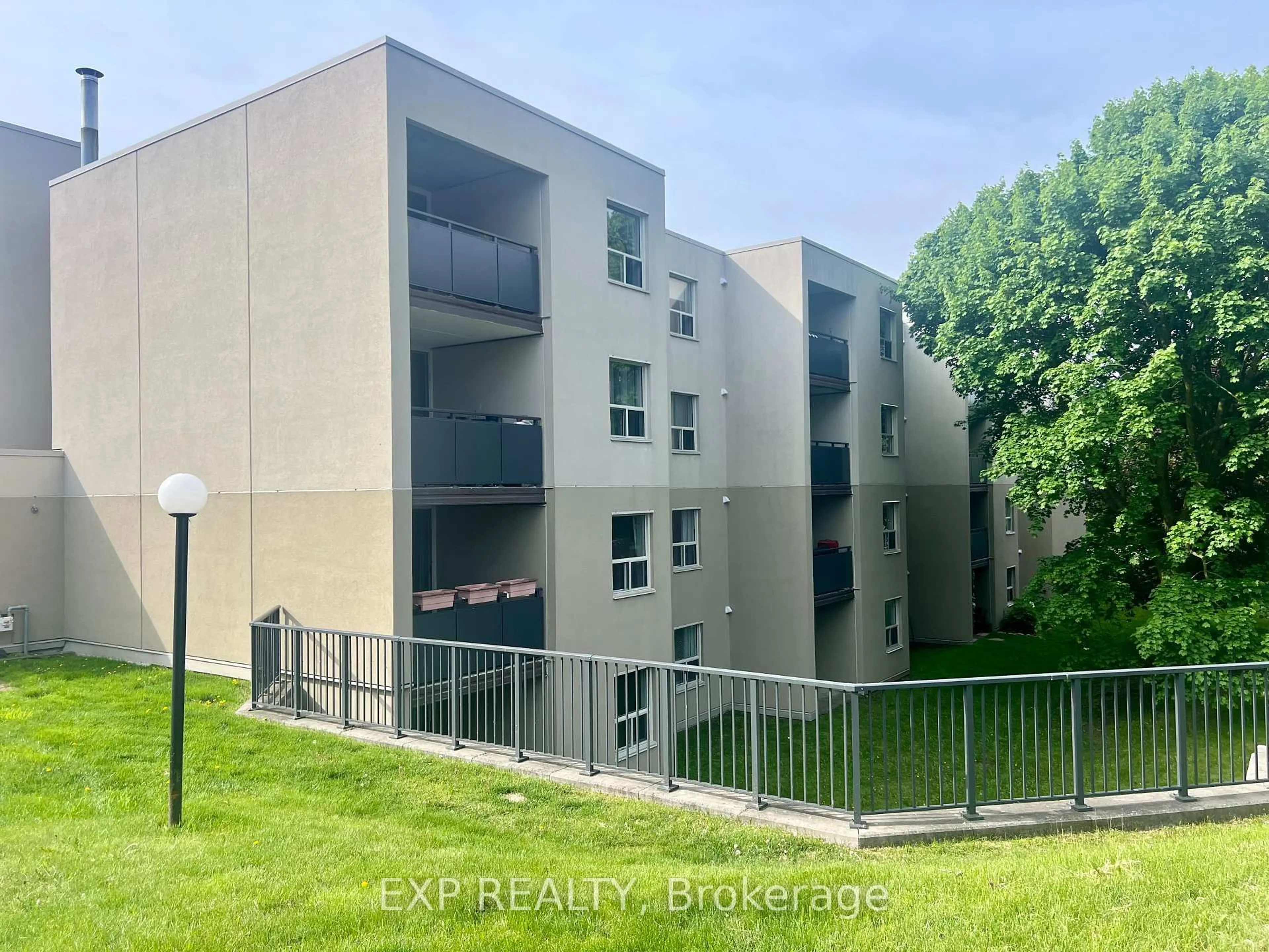 A pic from outside/outdoor area/front of a property/back of a property/a pic from drone, unknown for 75 Silvercreek Pkwy #308, Guelph Ontario N1H 7R9