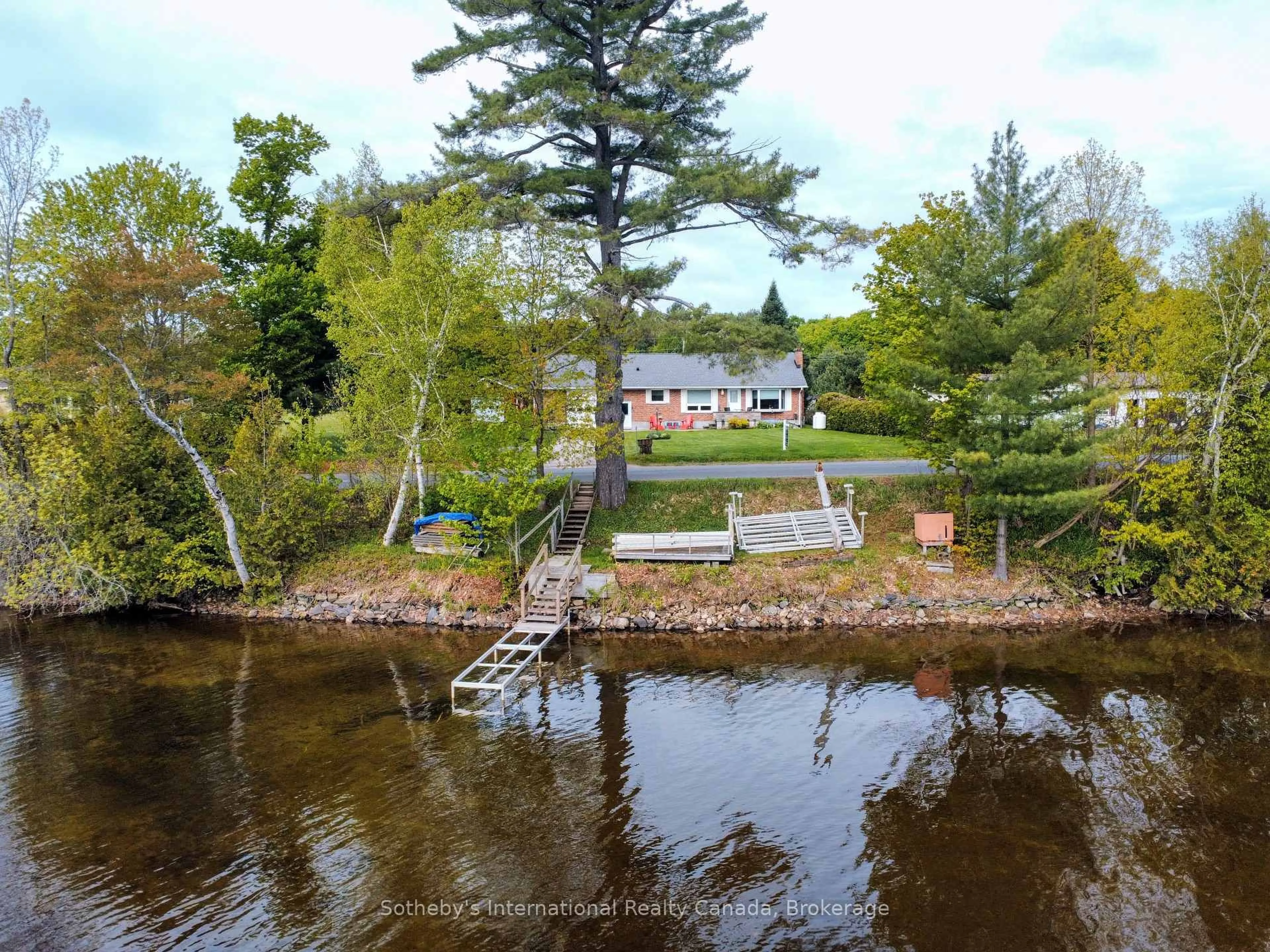 A pic from outside/outdoor area/front of a property/back of a property/a pic from drone, water/lake/river/ocean view for 1179 St Peters Rd, Algonquin Highlands Ontario K0M 1S0