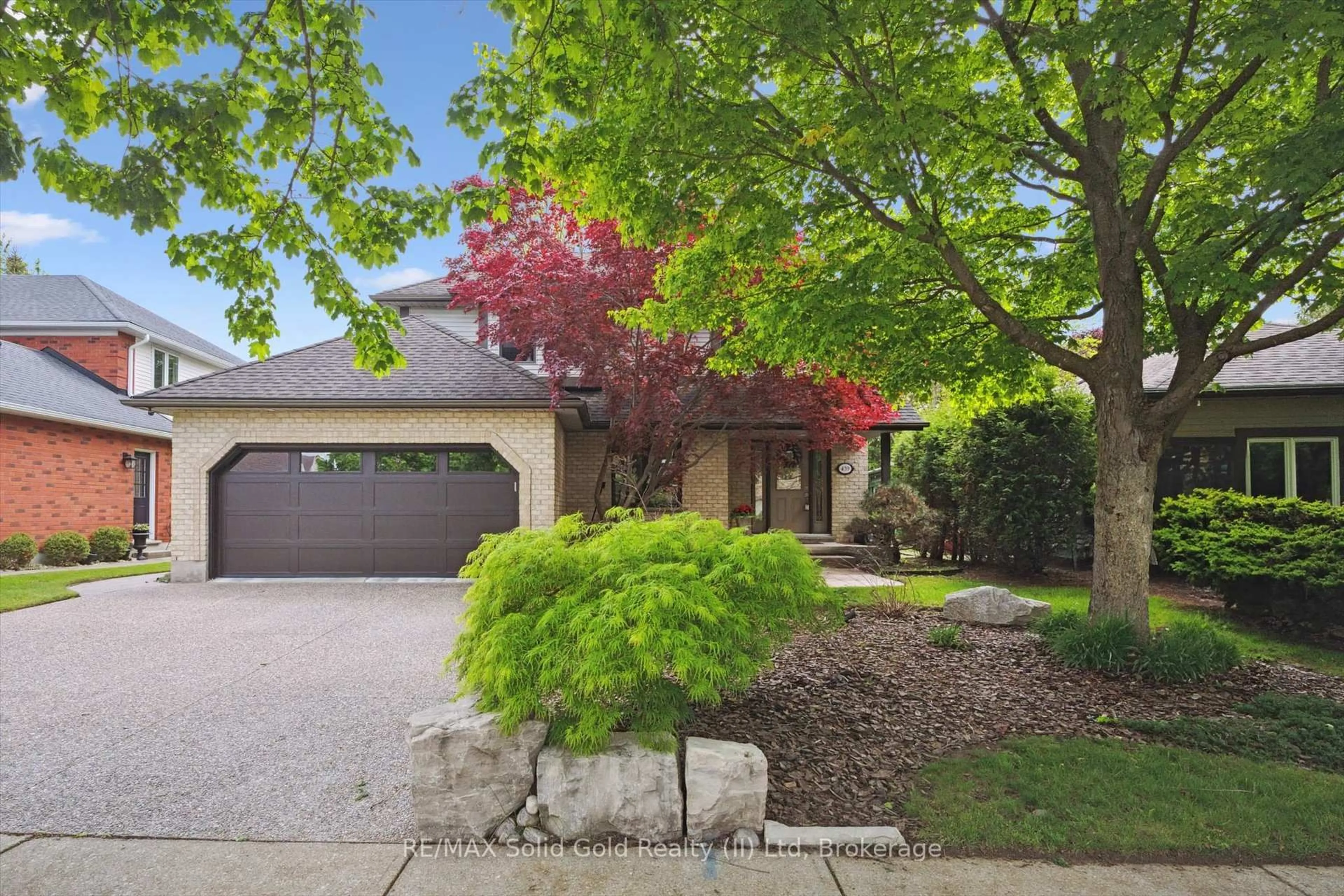 Home with brick exterior material, street for 439 Brentcliffe Dr, Waterloo Ontario N2T 2J6
