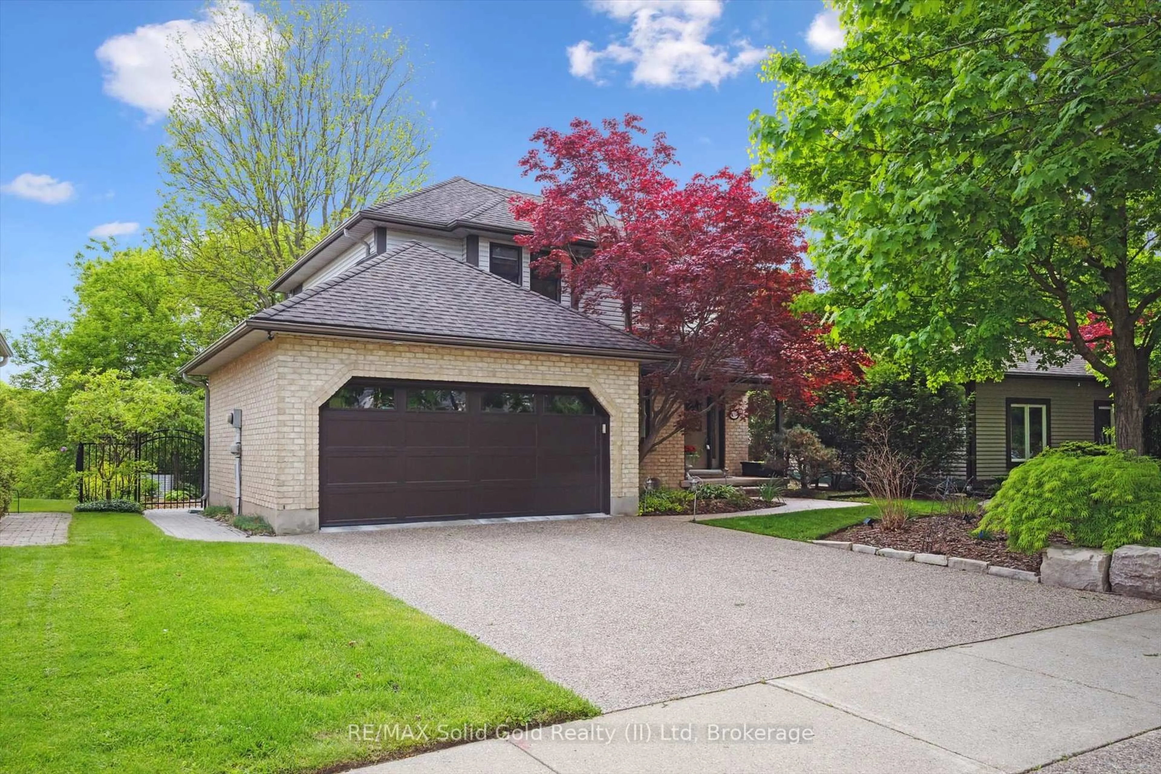 Home with brick exterior material, street for 439 Brentcliffe Dr, Waterloo Ontario N2T 2J6