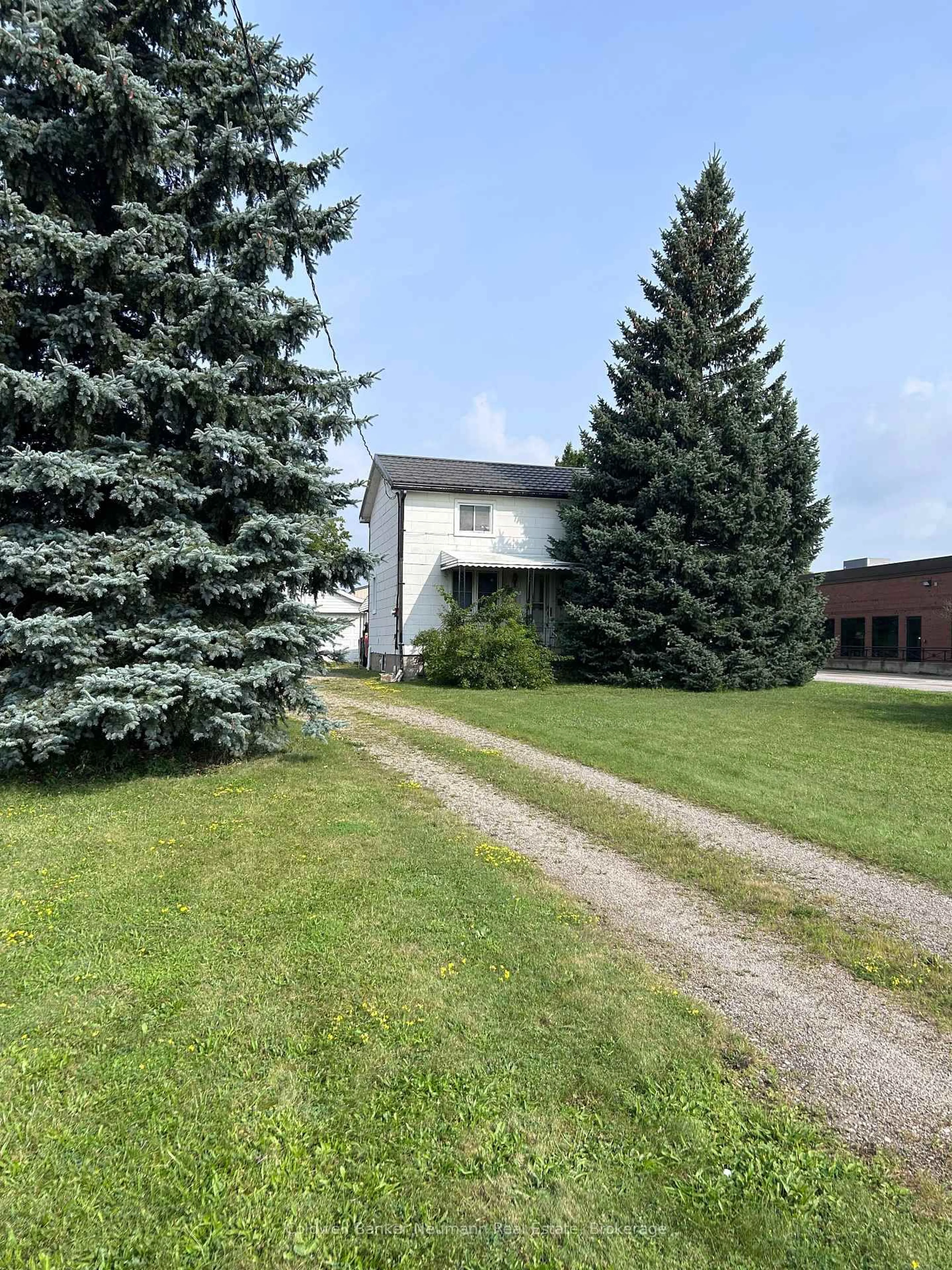 A pic from outside/outdoor area/front of a property/back of a property/a pic from drone, unknown for 393 Woodlawn Rd, Guelph Ontario N1H 7M1
