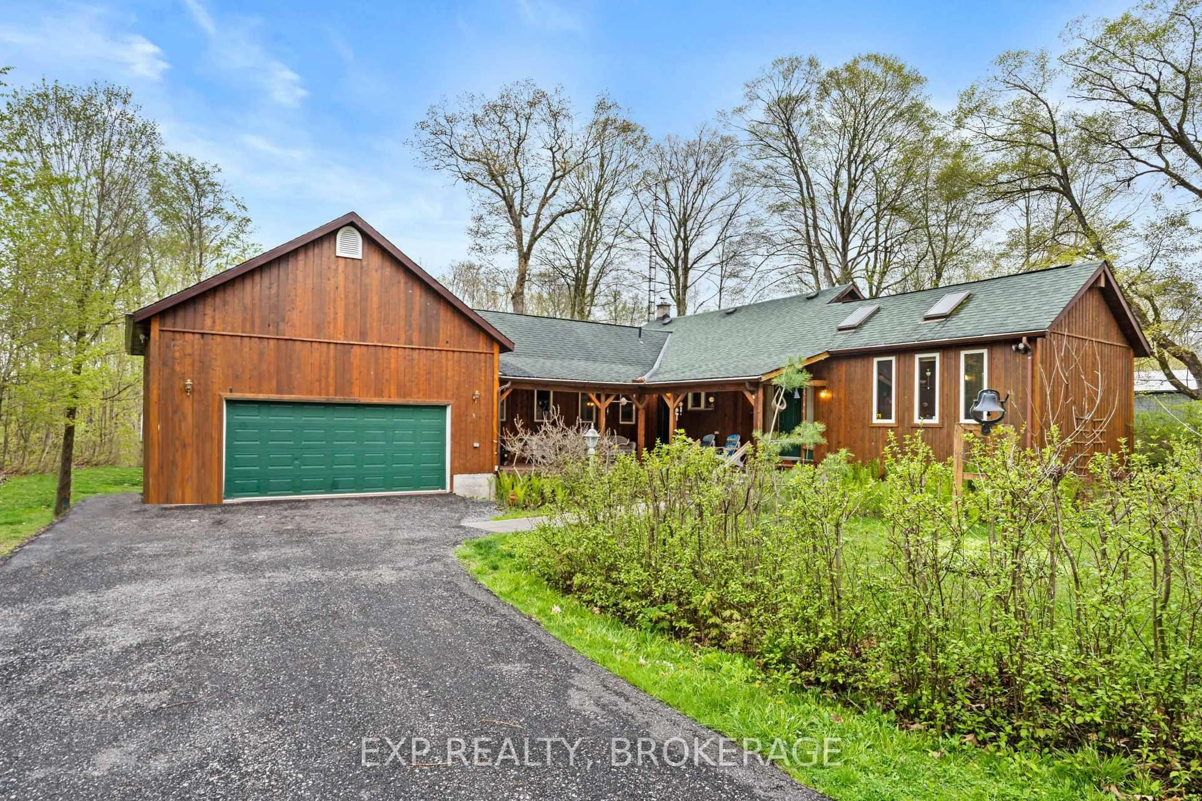 A pic from outside/outdoor area/front of a property/back of a property/a pic from drone, street for 5046 CARRYING PLACE Rd, Battersea Ontario K0H 1H0