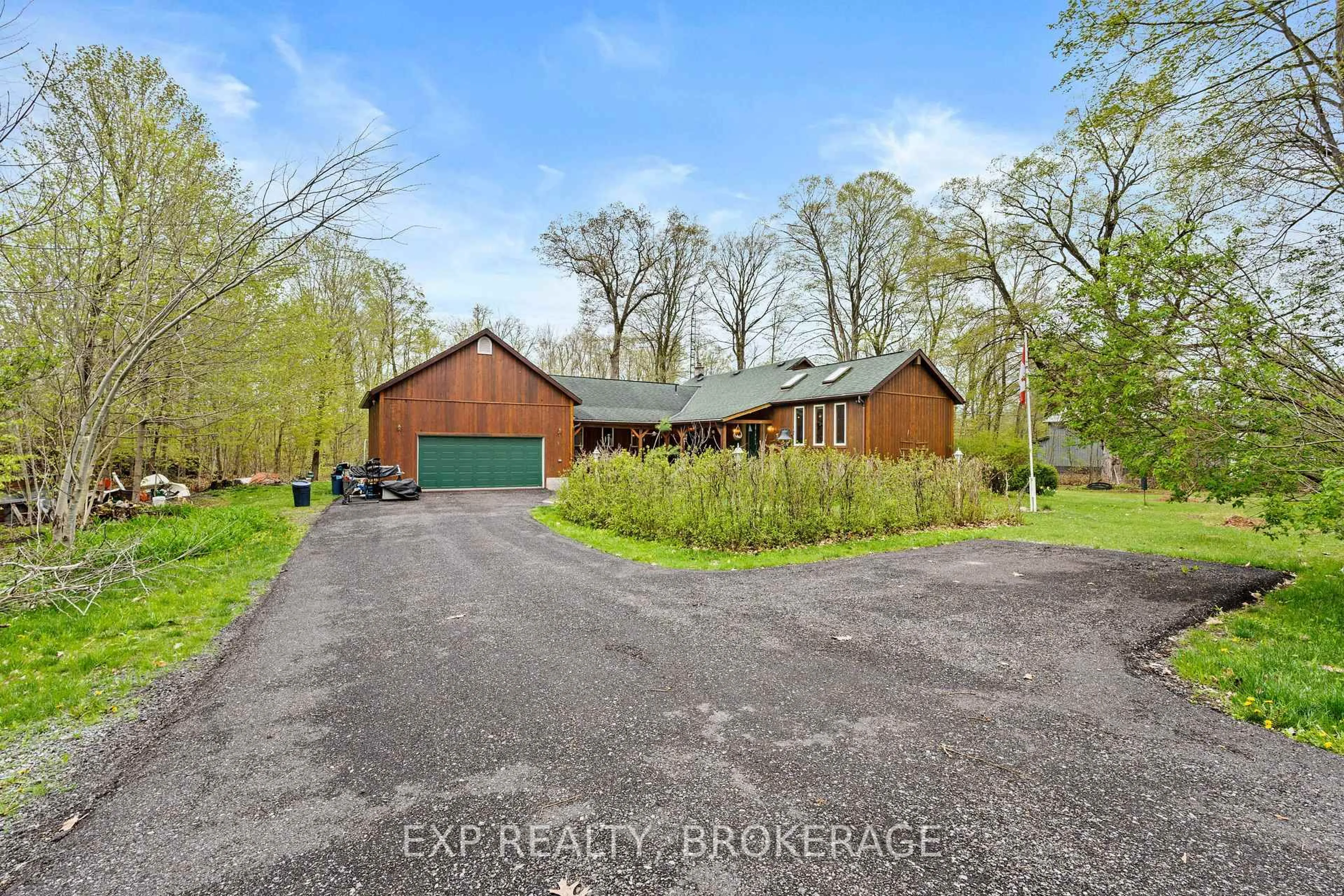 A pic from outside/outdoor area/front of a property/back of a property/a pic from drone, unknown for 5046 CARRYING PLACE Rd, Battersea Ontario K0H 1H0