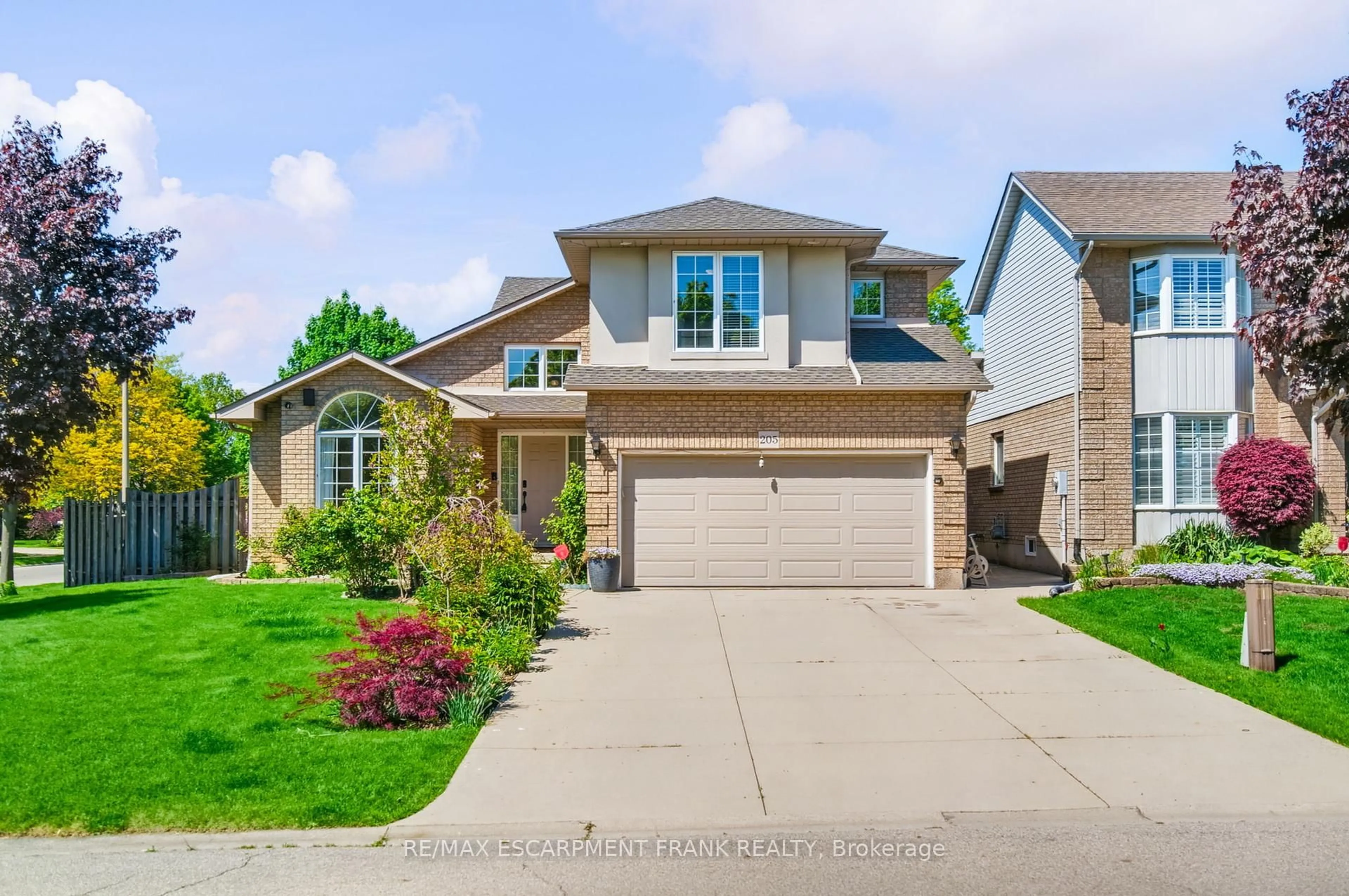 Home with brick exterior material, street for 205 Portage Lane, Hamilton Ontario L0R 1W0