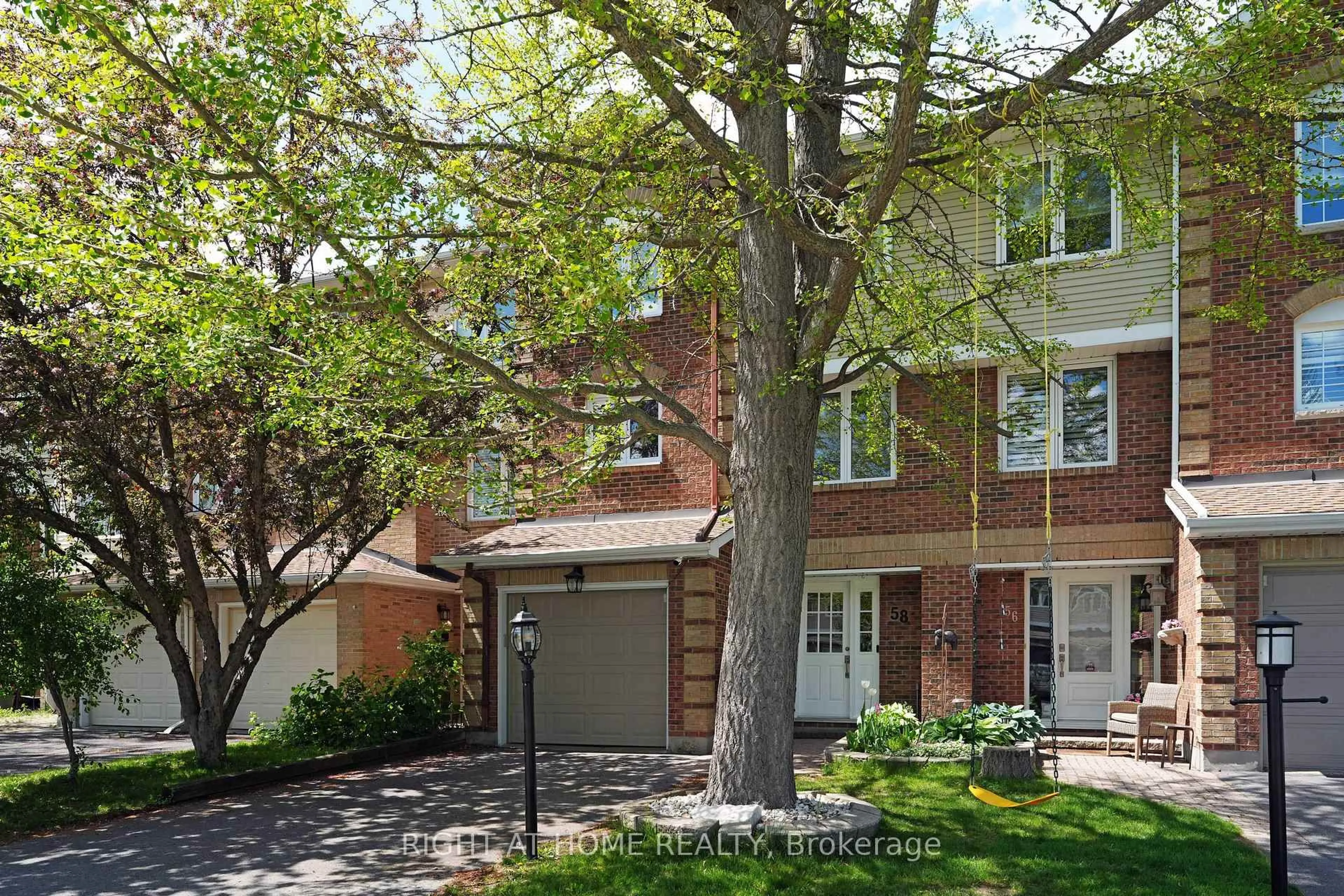 Home with brick exterior material, street for 58 Arbordale Cres, Ottawa Ontario K2G 5C9