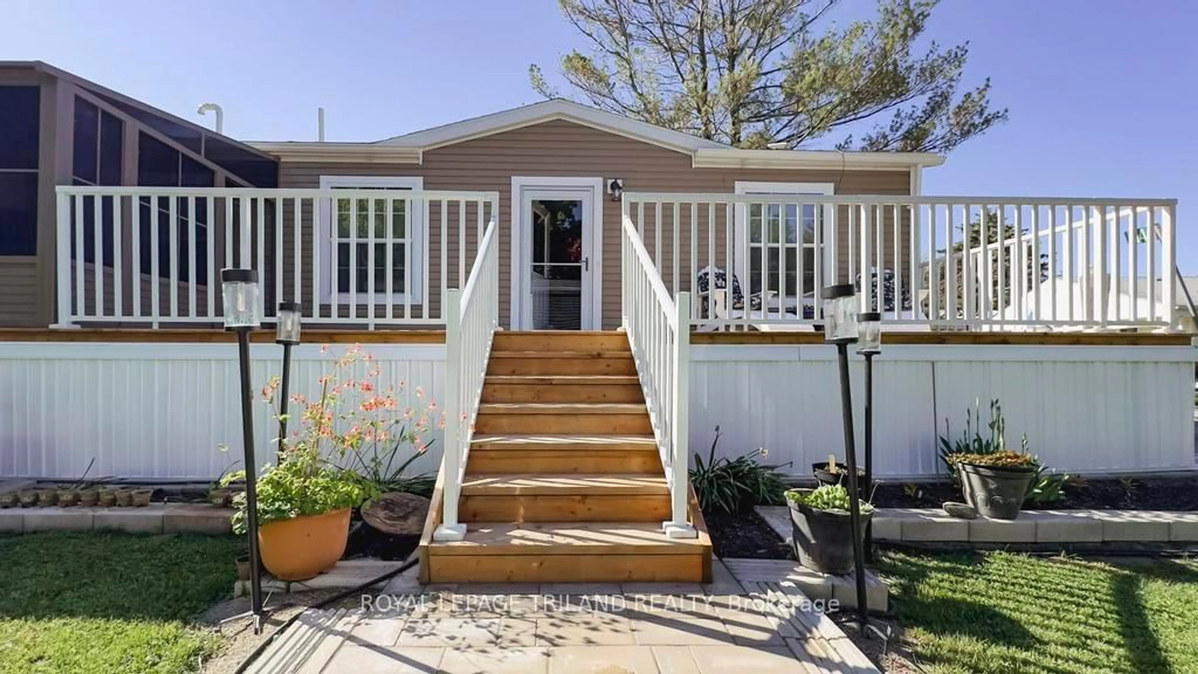 Home with vinyl exterior material, street for 9385 Ipperwash Rd #14, Lambton Shores Ontario N0N 1J3