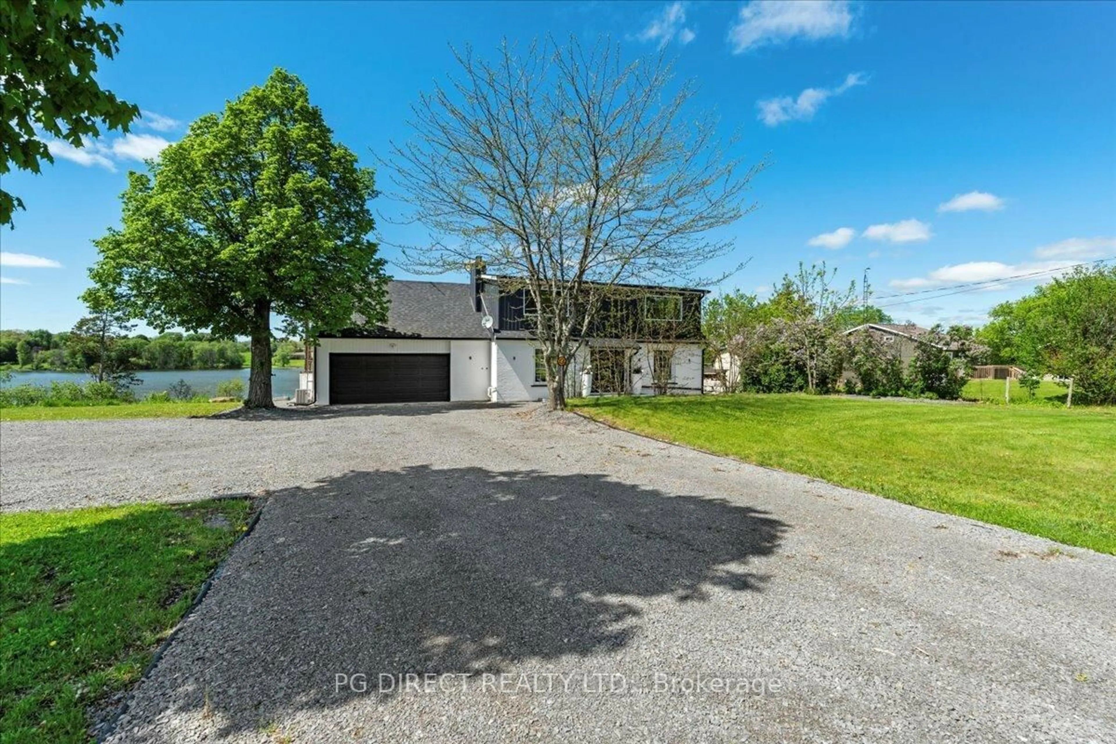 A pic from outside/outdoor area/front of a property/back of a property/a pic from drone, street for 1223 South Shore Rd, Napanee Ontario K7R 3K7