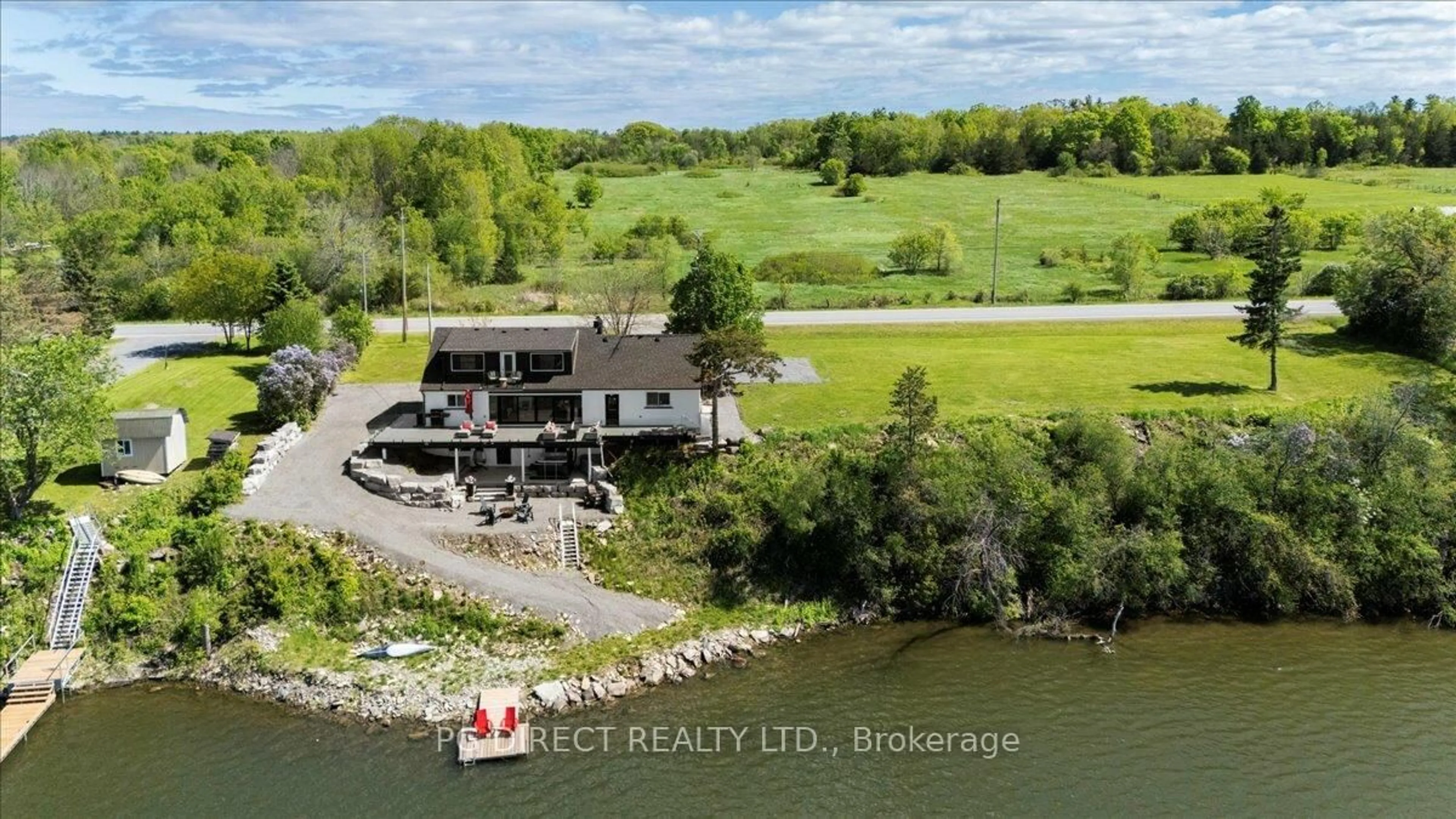 A pic from outside/outdoor area/front of a property/back of a property/a pic from drone, water/lake/river/ocean view for 1223 South Shore Rd, Napanee Ontario K7R 3K7