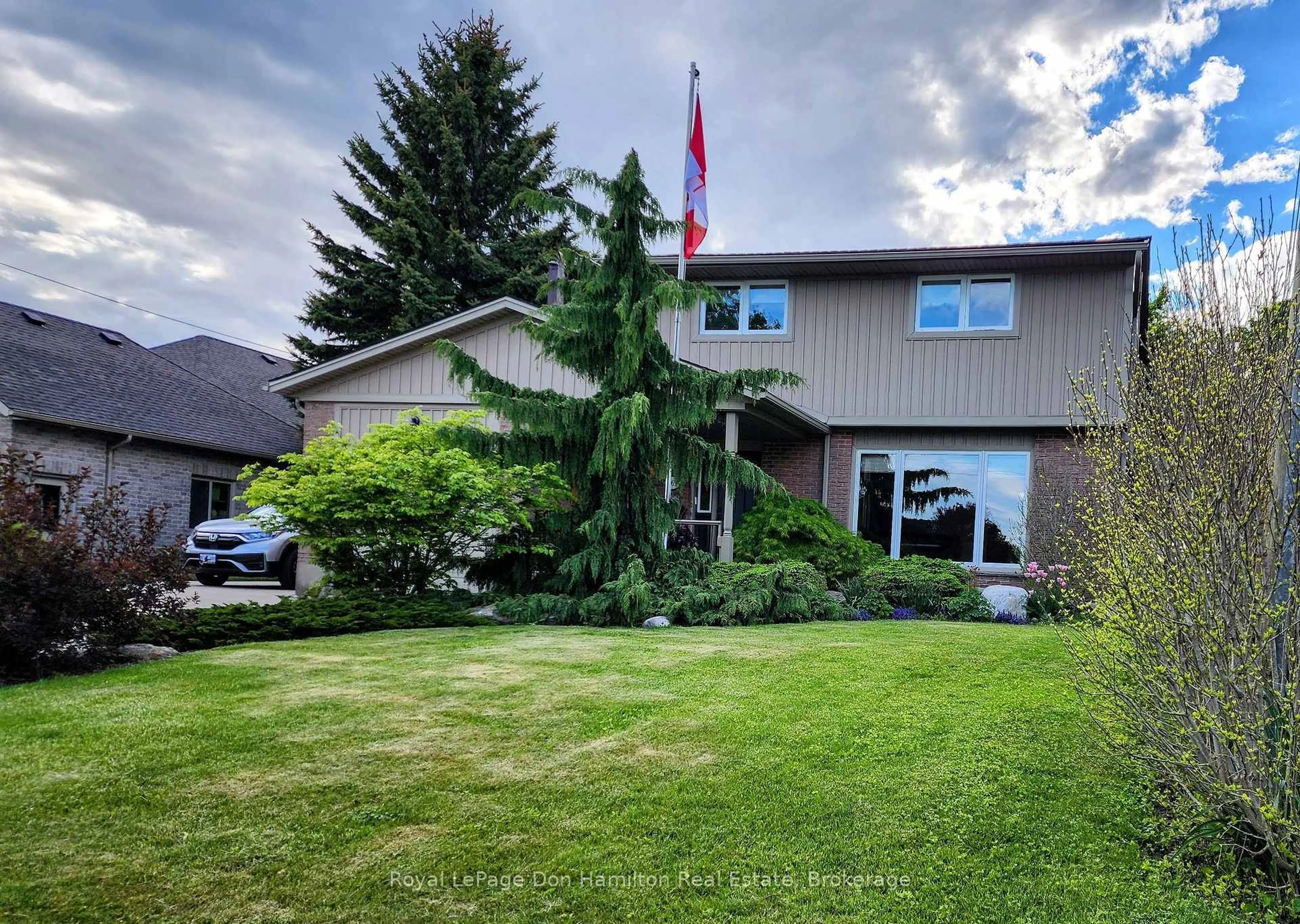 A pic from outside/outdoor area/front of a property/back of a property/a pic from drone, mountain view for 465 Boyne Ave, North Perth Ontario N4W 3K5