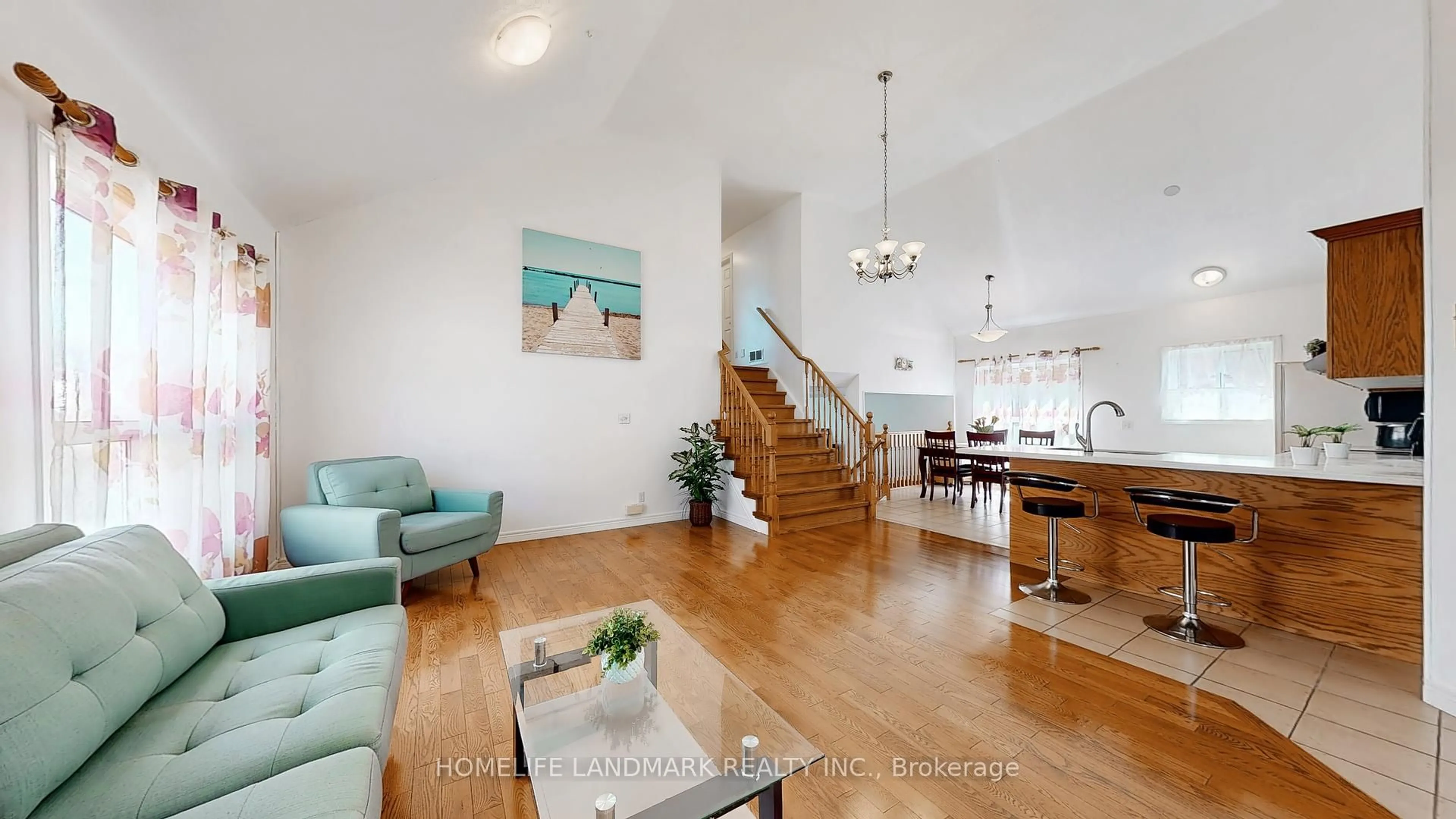 Living room with furniture, wood/laminate floor for 402 Woodrow Dr, Waterloo Ontario N2T 2T5