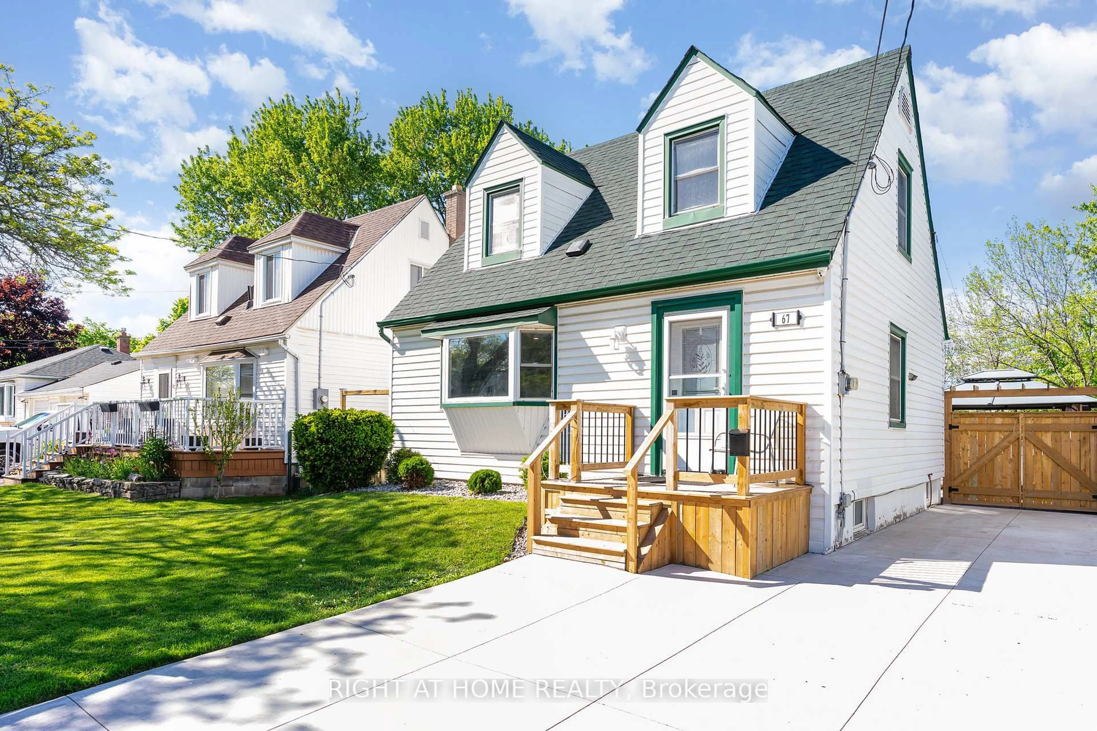 Home with vinyl exterior material, street for 67 Martha St, Hamilton Ontario L8H 2C2