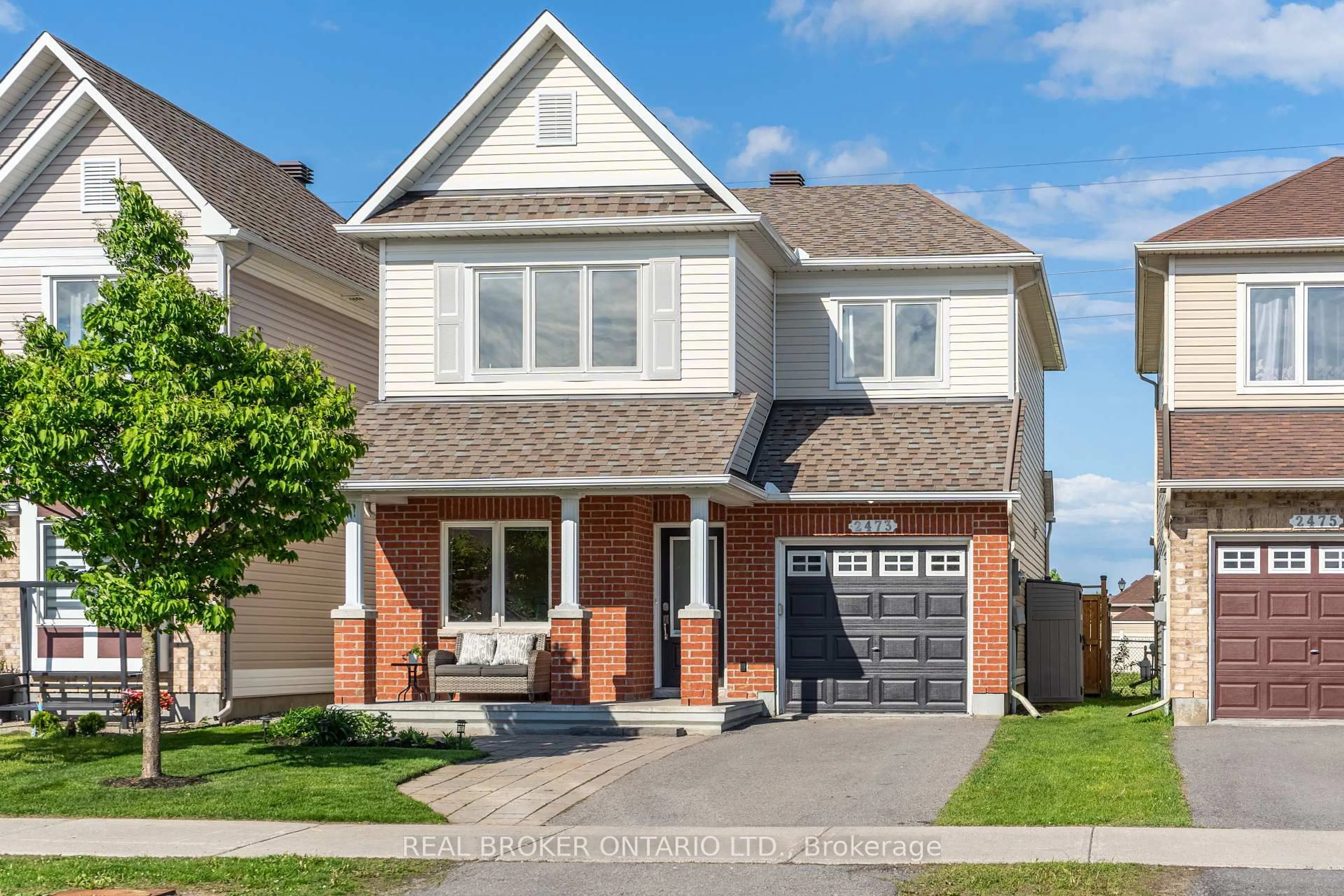 Home with brick exterior material, street for 2473 Esprit Dr, Orleans Ontario K4A 0S6